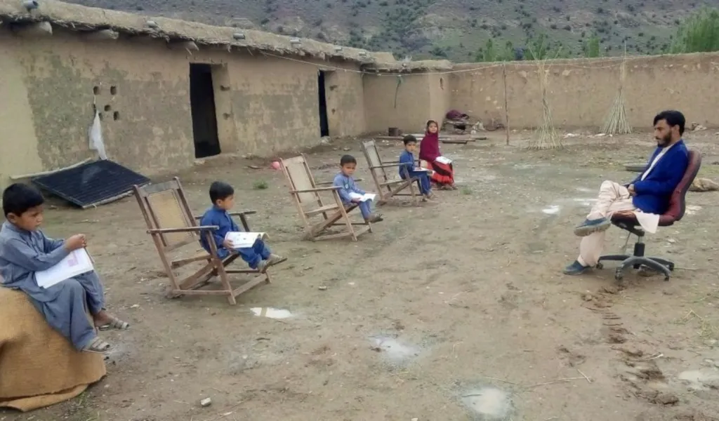 A man delivers a class in Sherani District in Balochistan. Support for the class was provided by the “My Home, My School” initiative.