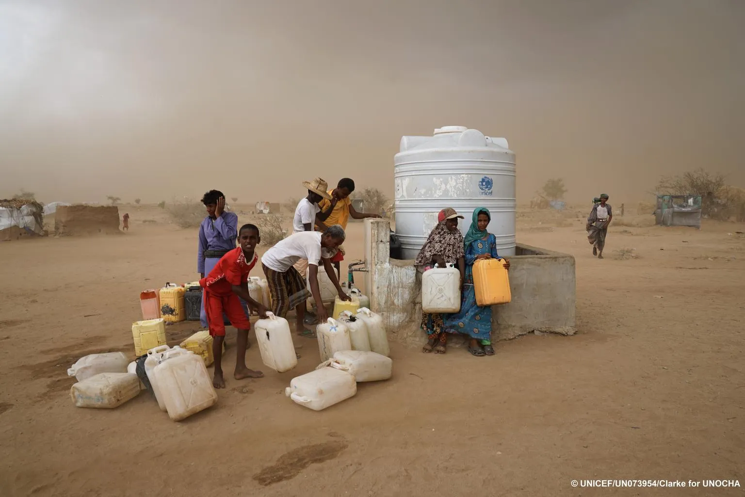 Children collect water in Hajjah Yemen