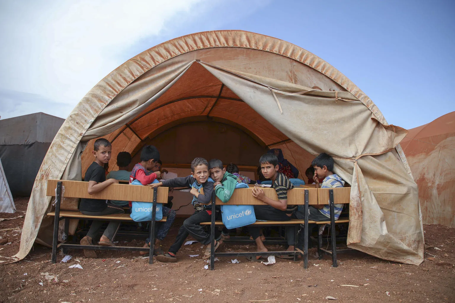 children in a temporary school in Syria