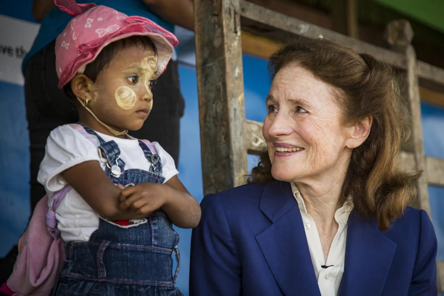 UNICEF Executive Director Henrietta Fore sits with a child during visit to Myanmar