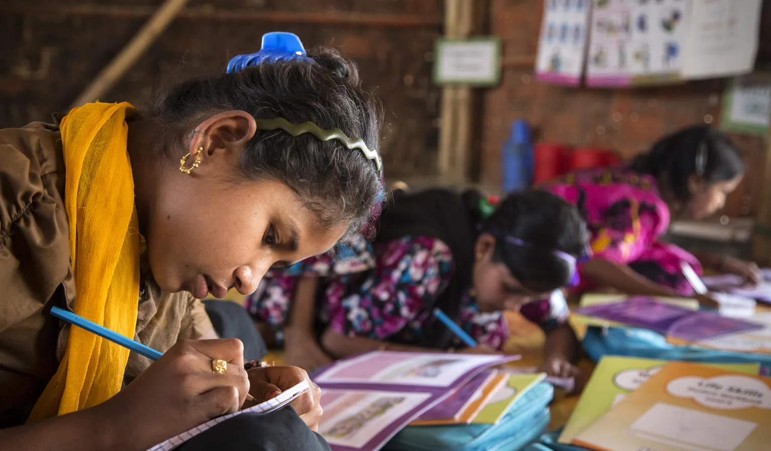 Girls study at a school in Bangladesh.