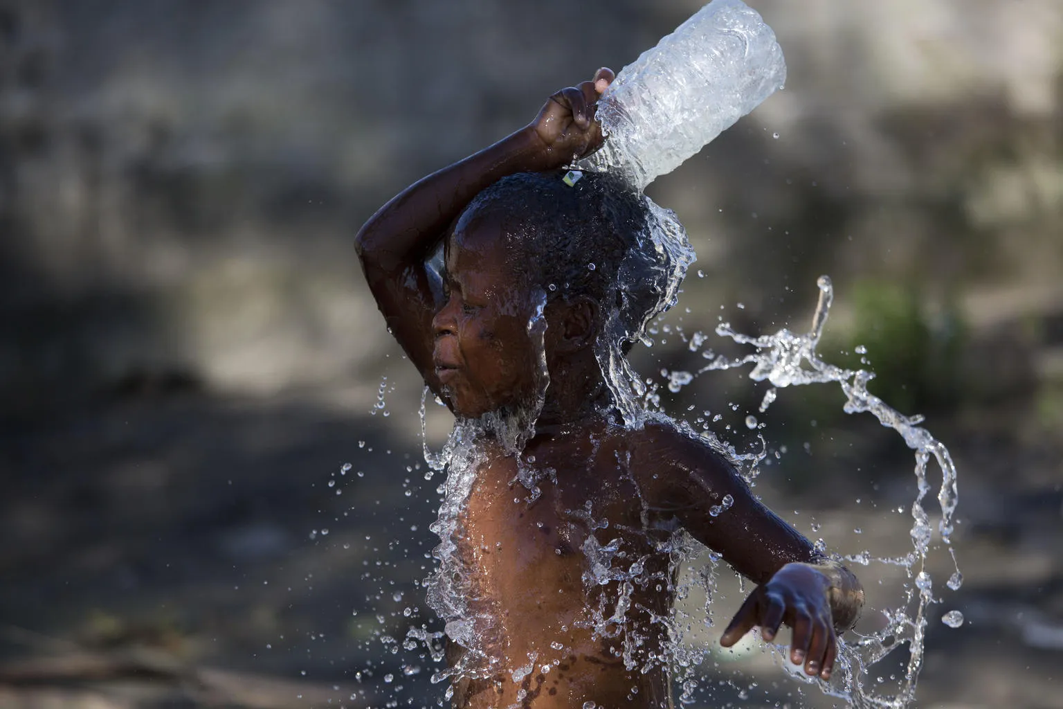 boy washes himself