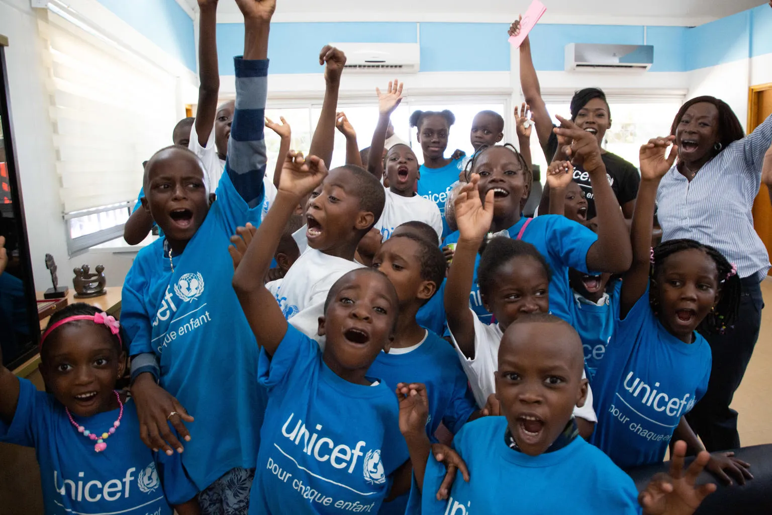 Children in Cote D'Ivoire celebrate Easter at a UNICEF sponsored event.