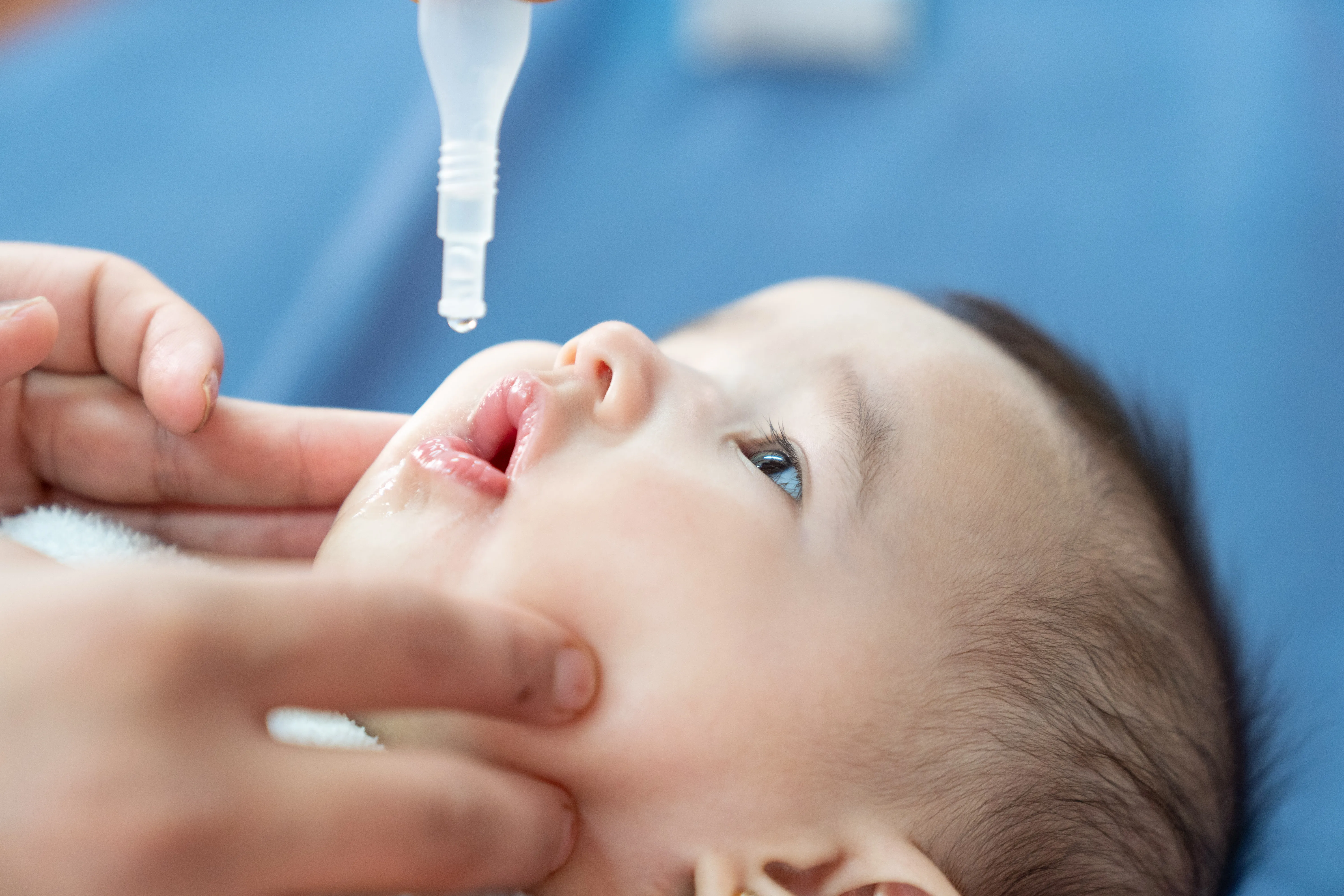 Eman, one month old, receives her vaccinations in one of the UNICEF-supported health clinics in Azraq Refugee Camp.