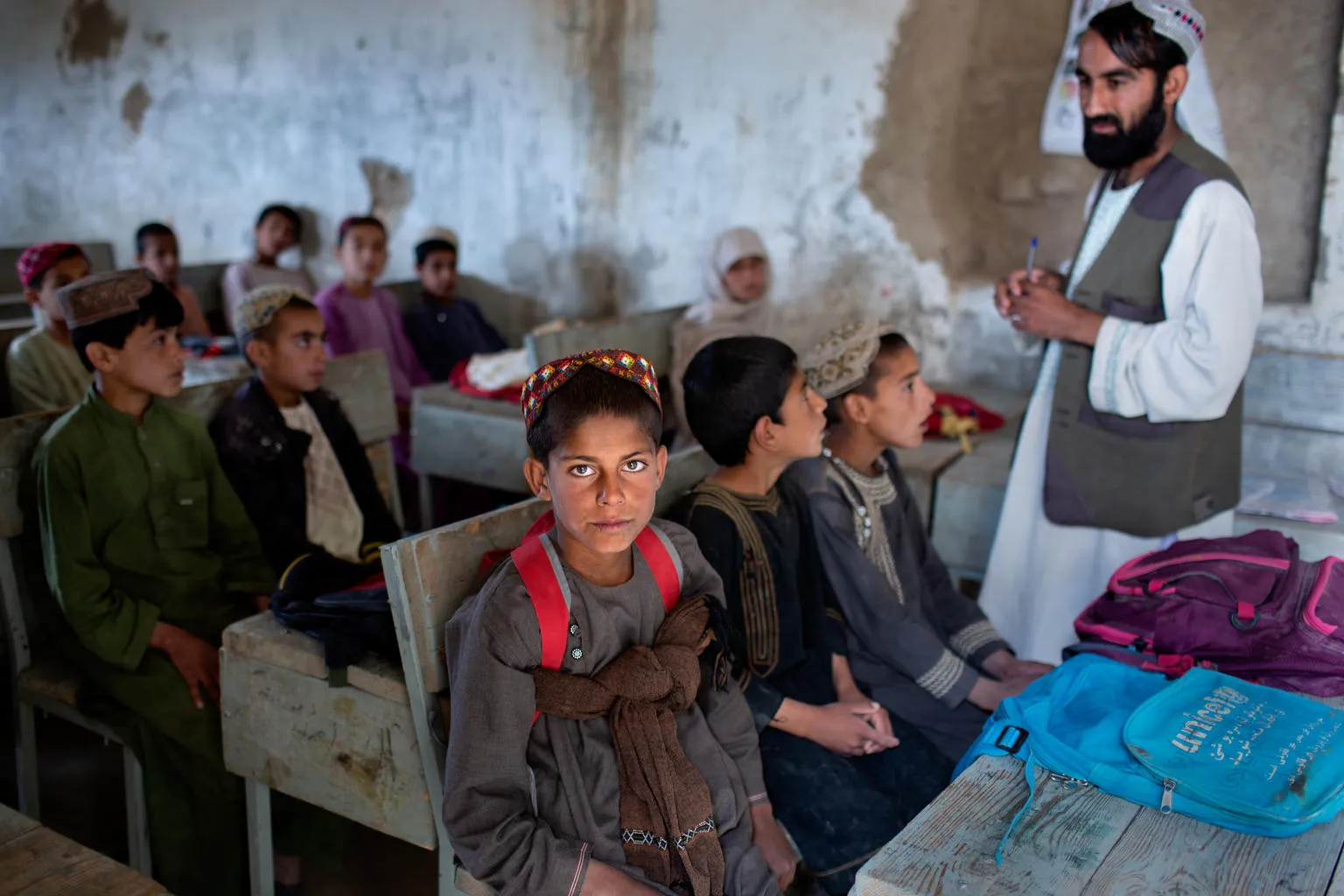 boy sits in school