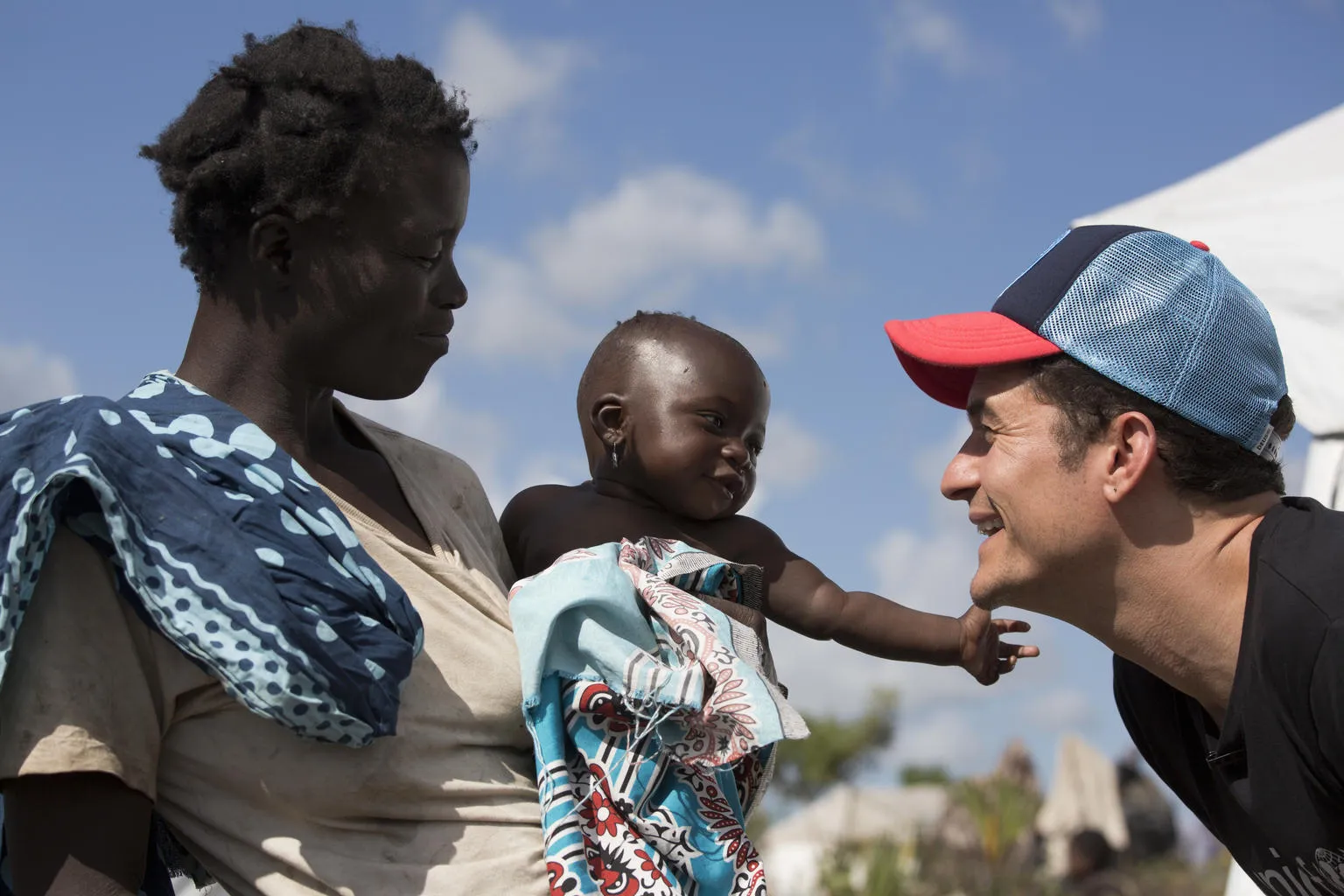 Orlando Bloom visits mother and daughter in Beira, Mozambique