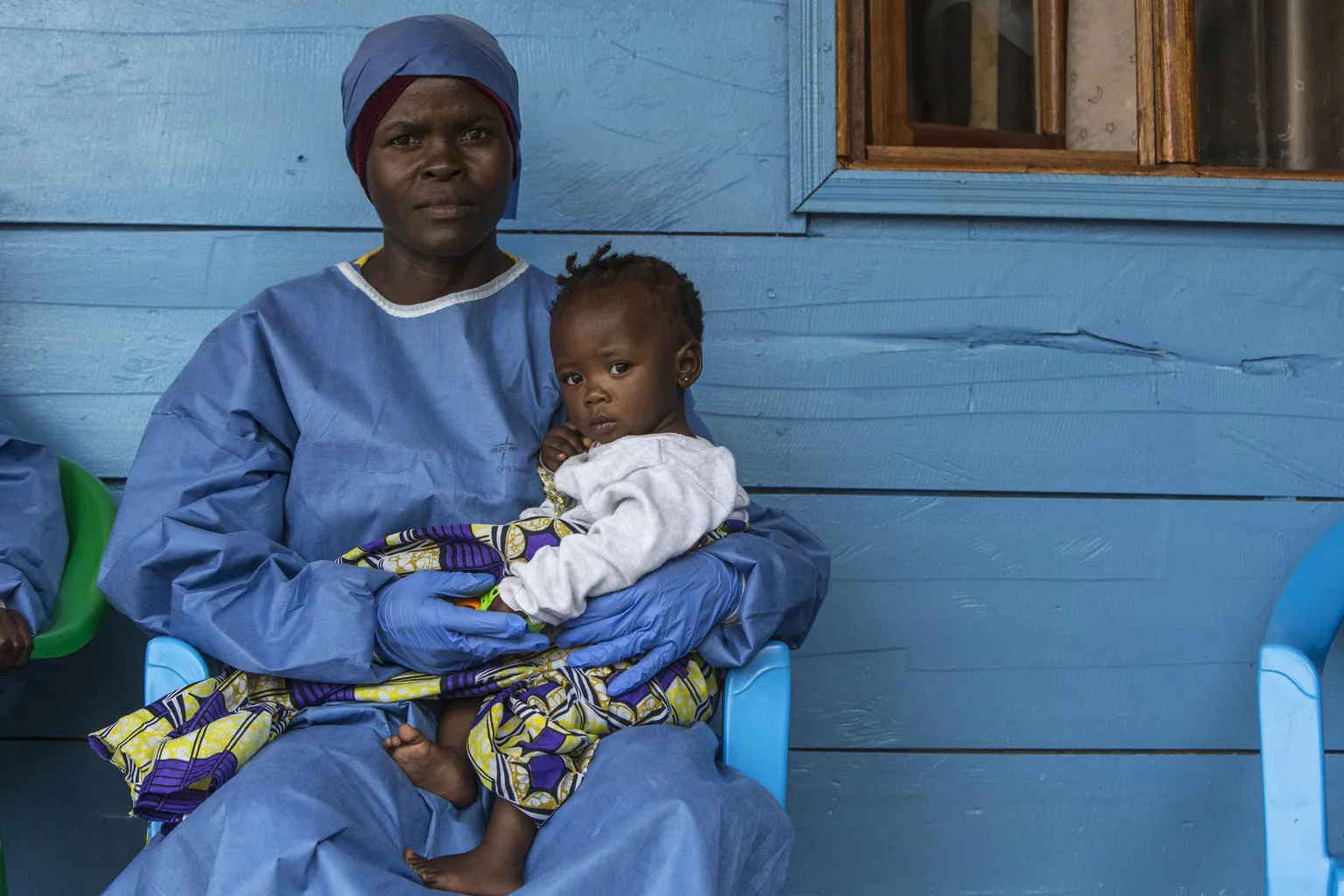 woman caring for children orphaned by Ebola