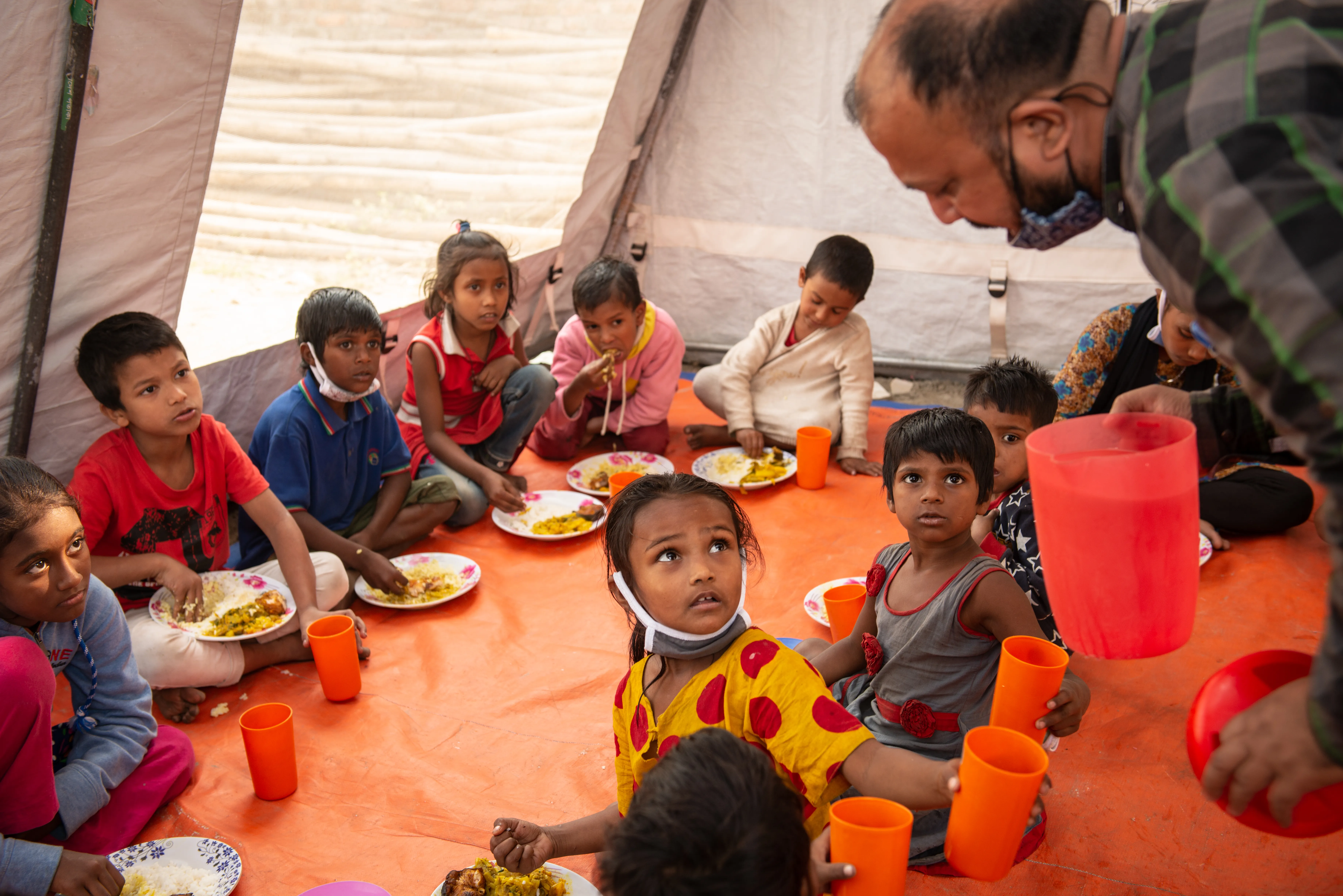 Children from the Child Protection Service Hub having their lunch