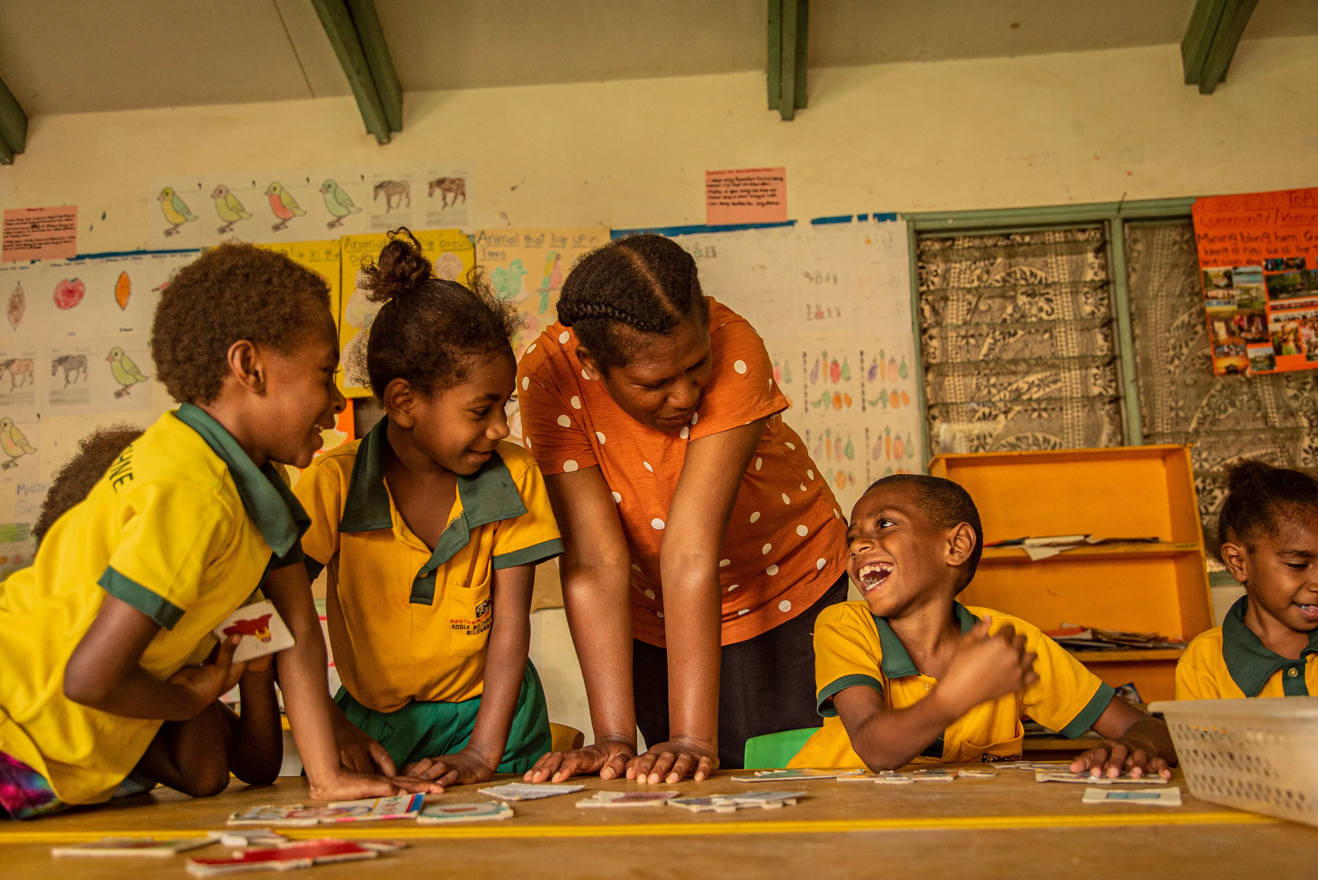 On 28th October, Janet, Special Needs Teacher, helps class 1 students in mainstream classroom during a group activity in Freswota, Port Vila, Vanuatu