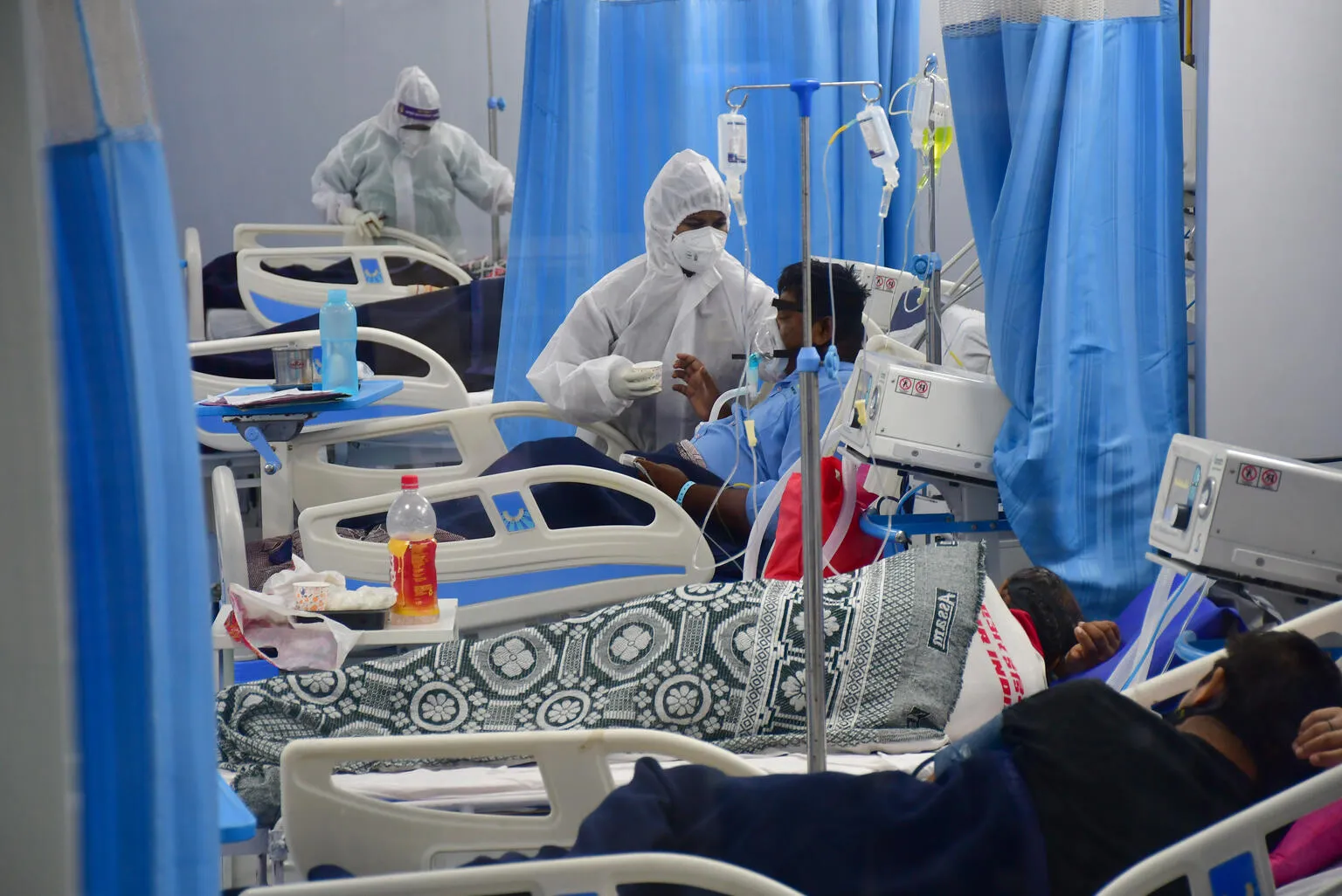 On 6 May 2021, patients receive treatment in the ICU ward at Mulund Jumbo's COVID-19 centre in Mumbai, India.