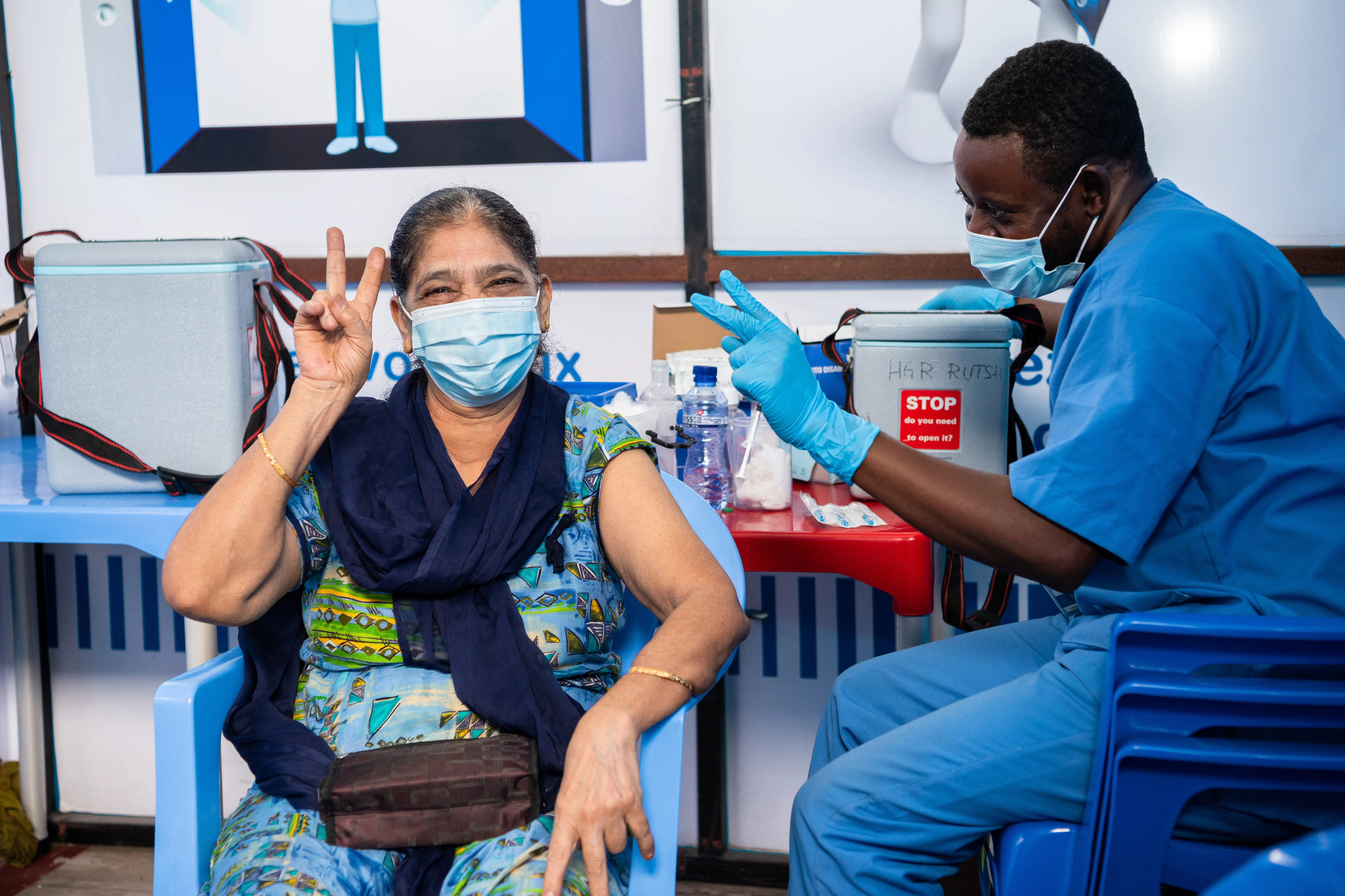 Shah SULTANA FARISHTA, 66,is being vaccinated against COVID-19 at the HJ Hospital.