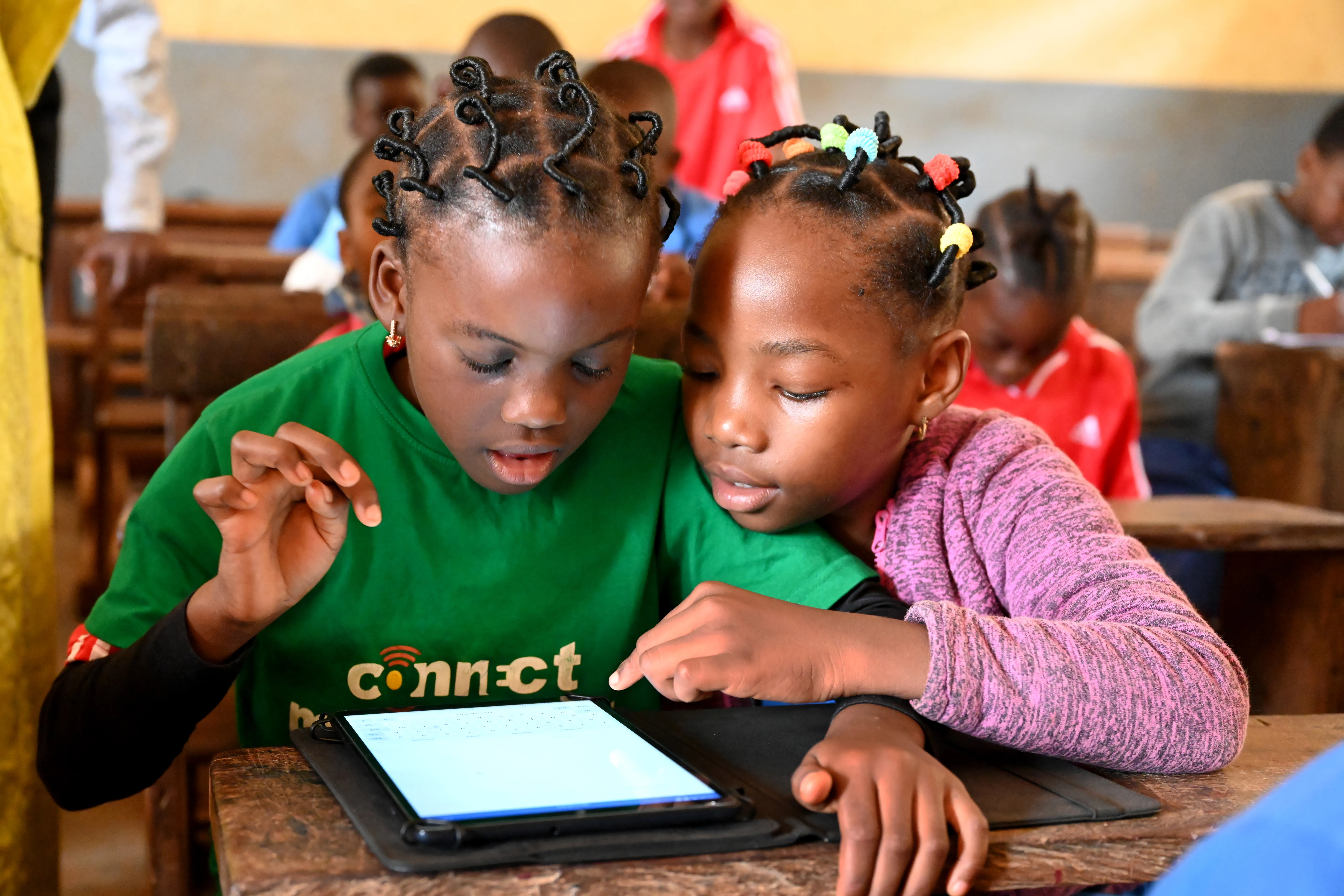 Children learn with tablets and computers in the Public Melen School of Yaoundé, the capital of Cameroon.