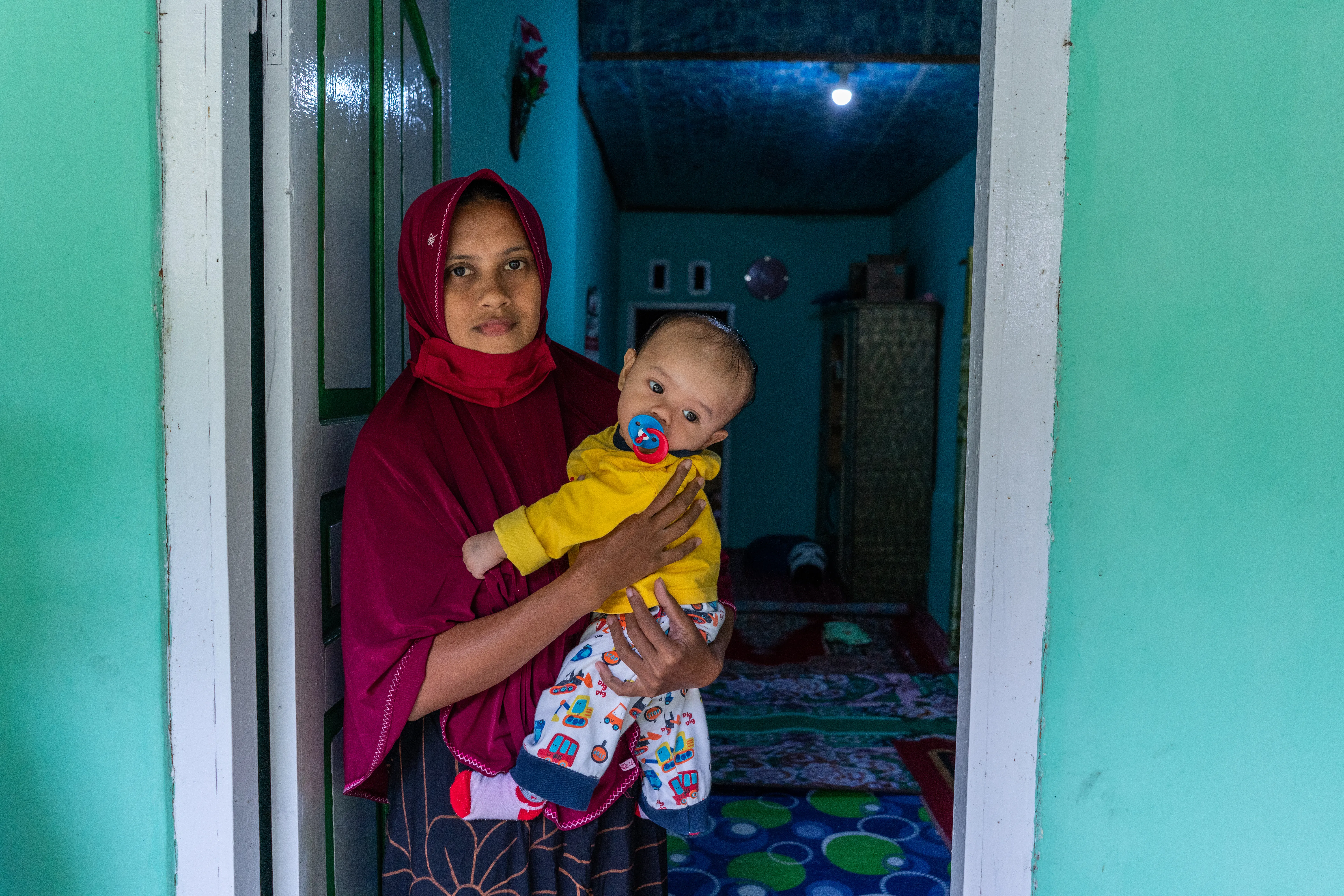 On 30 November 2021, UNICEF staff meet with beneficiaries during a visit to review progress of a cross-sectoral UNICEF programme aimed at reducing malnutrition in Sabang, Aceh Province, Indonesia.