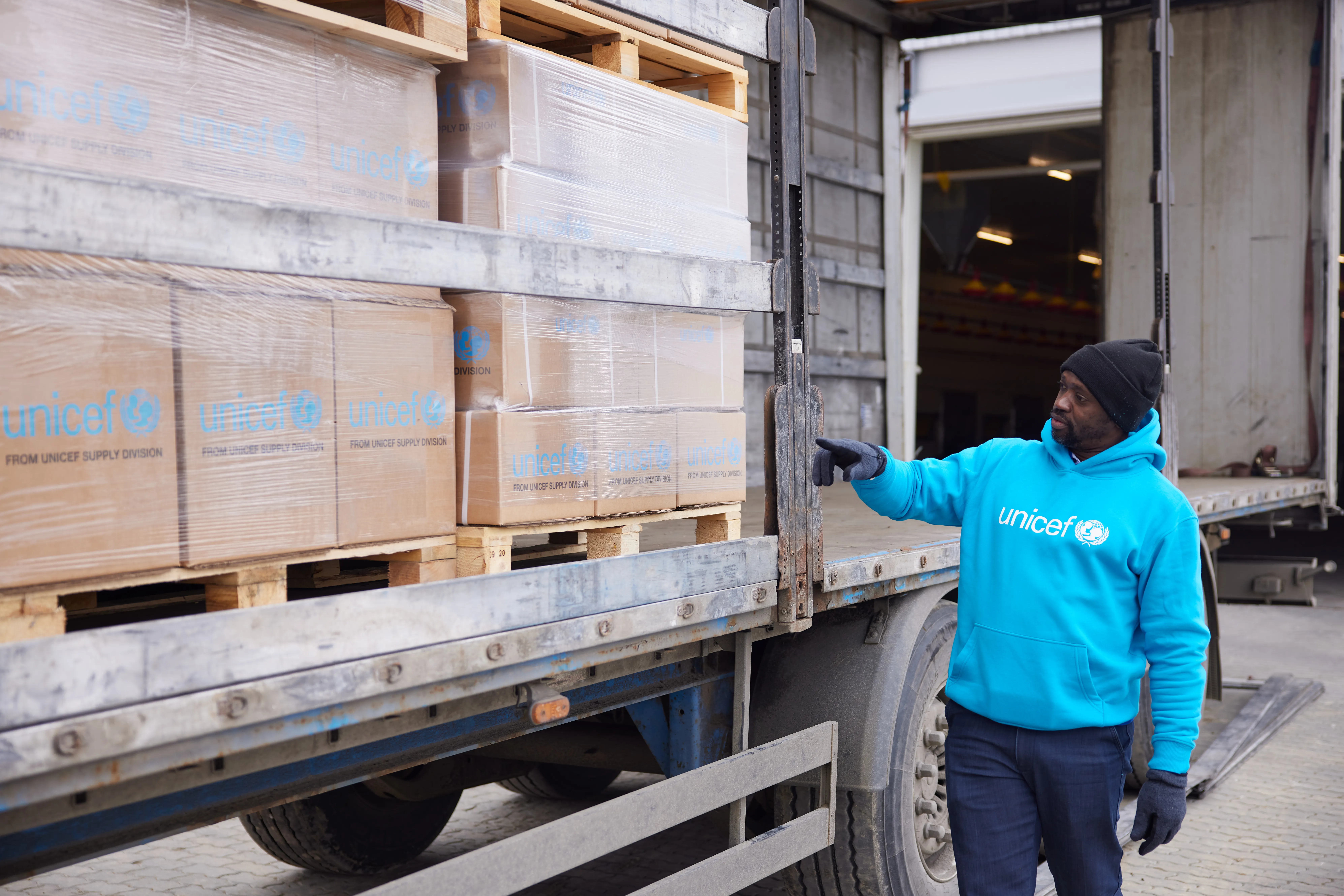 On 6 March 2022, a UNICEF staff inspects supplies that have just arrived in Lviv, western Ukraine, from UNICEF’s Global Supply and Logistics Hub in Copenhagen.
