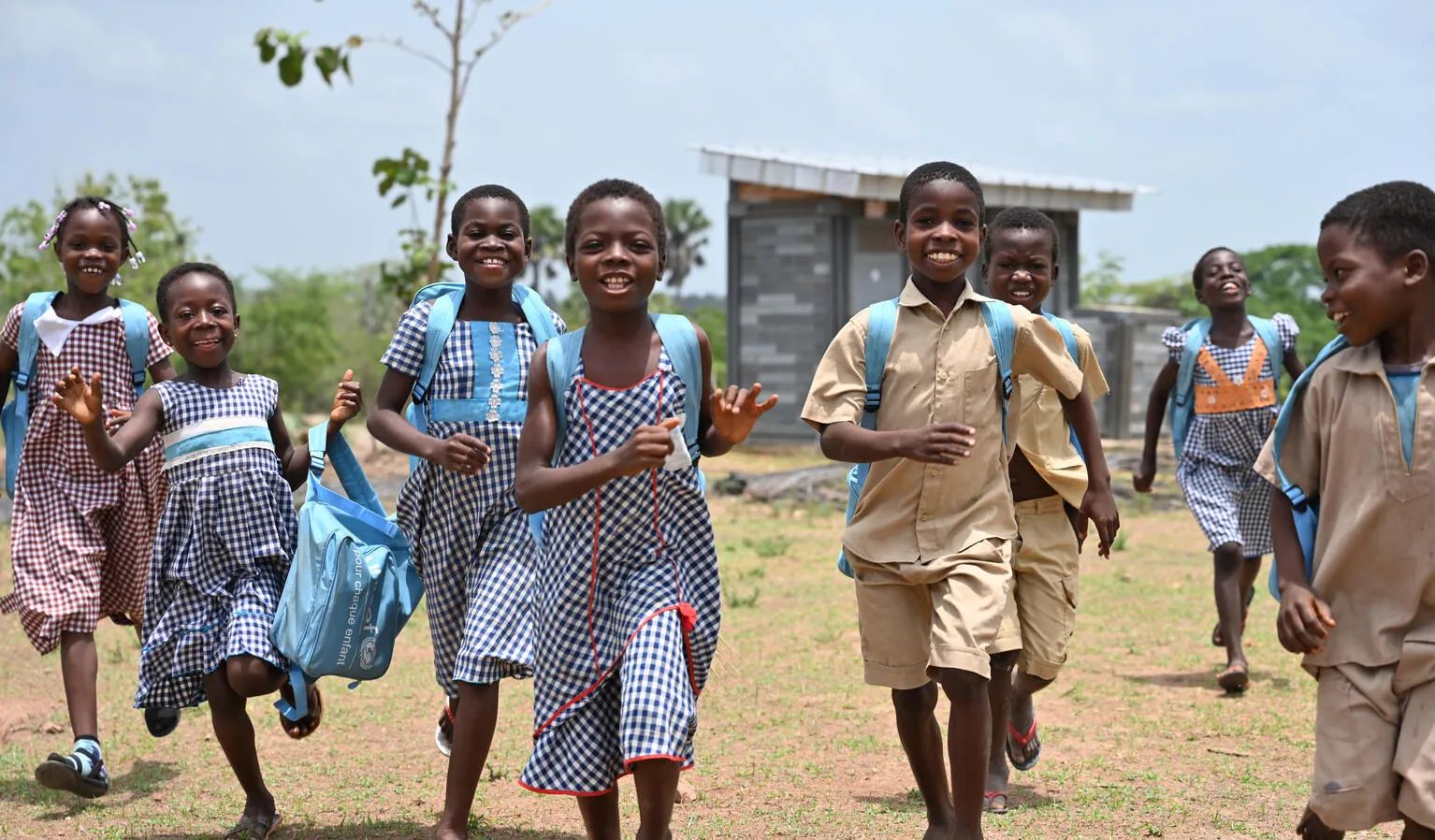 Children at the playground of their school made out of recycled plastic bricks, in Sakassou, in the center of Côte d’Ivoire.