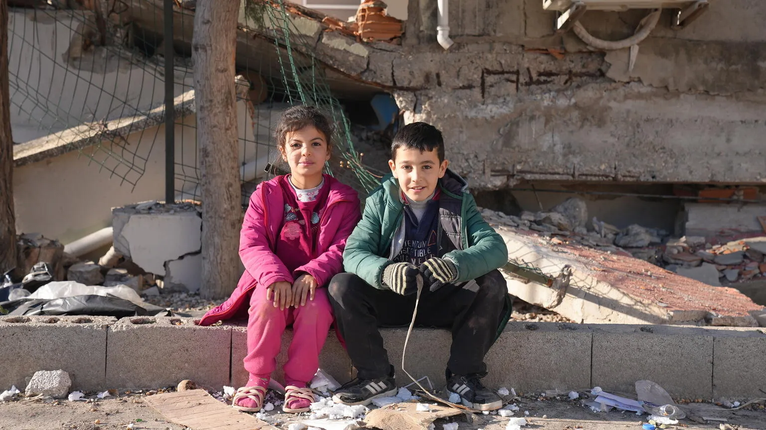 Two friends reuniting after the earthquake in Hatay.