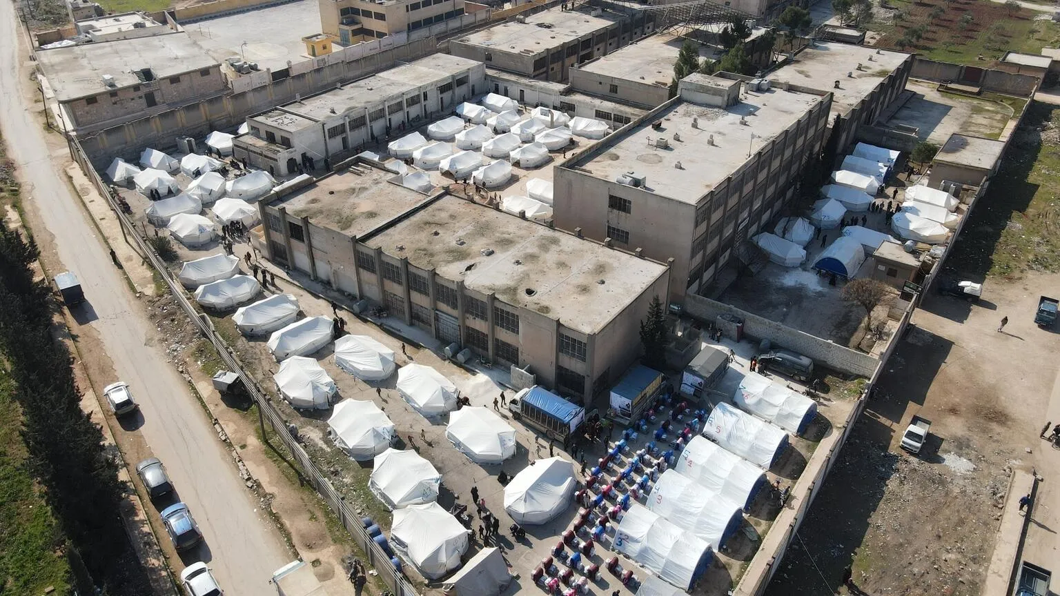 This aerial photograph shows tents at a temporary shelter for people affected by the earthquakes.