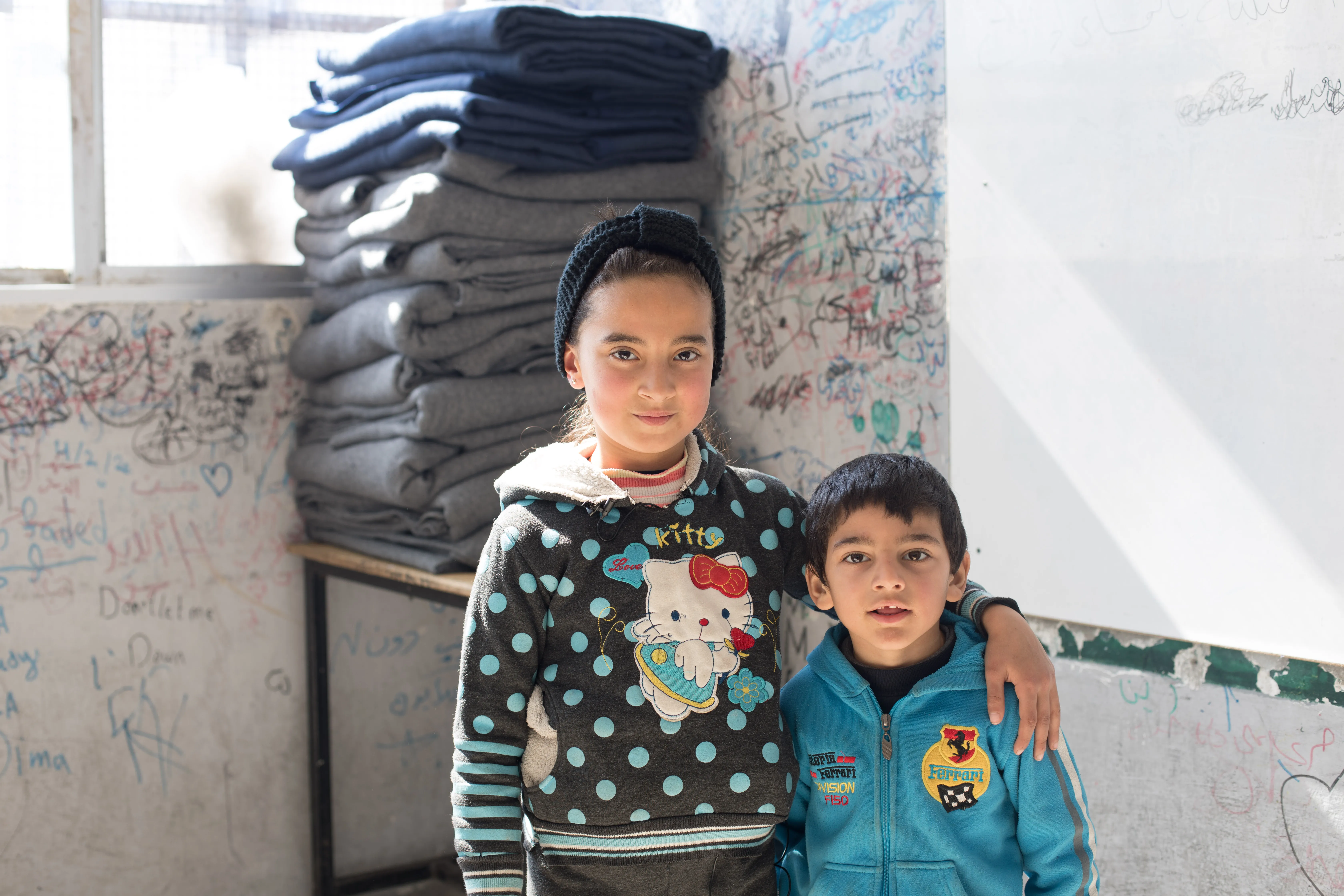 “I don’t think it’s okay to bring your toys here. There are some children without any toys. They will feel bad, because some of them did not have a chance to take their toys from their homes before it collapsed,” says nine-year-old Shahed on 19 February 2023 at Hussien Bin Ali School, which has been turned into a shelter.