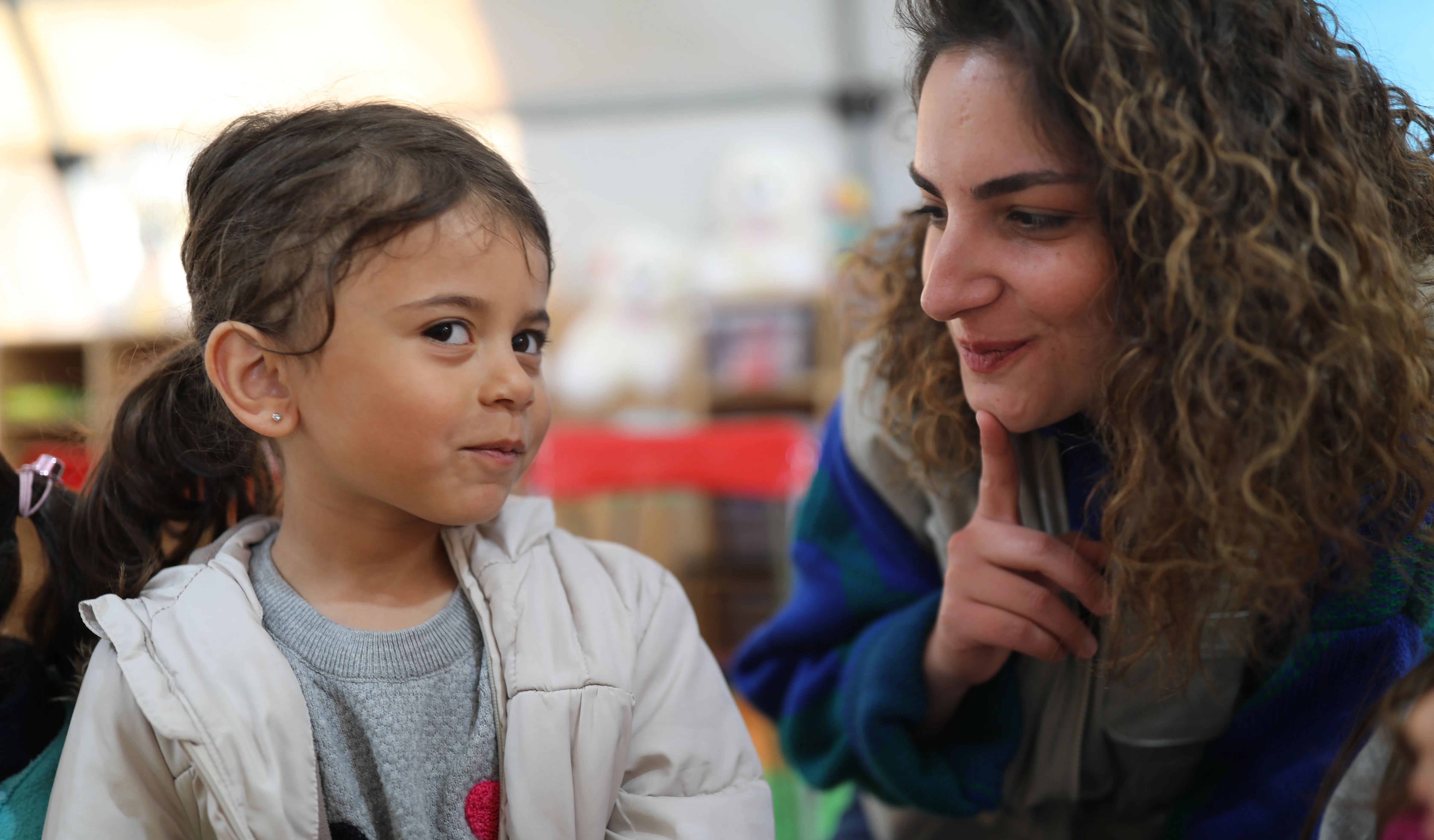 Little Elanur joins a psycho-social support activity at UNICEF supported CFS in Kahramanmaraş, Türkiye.