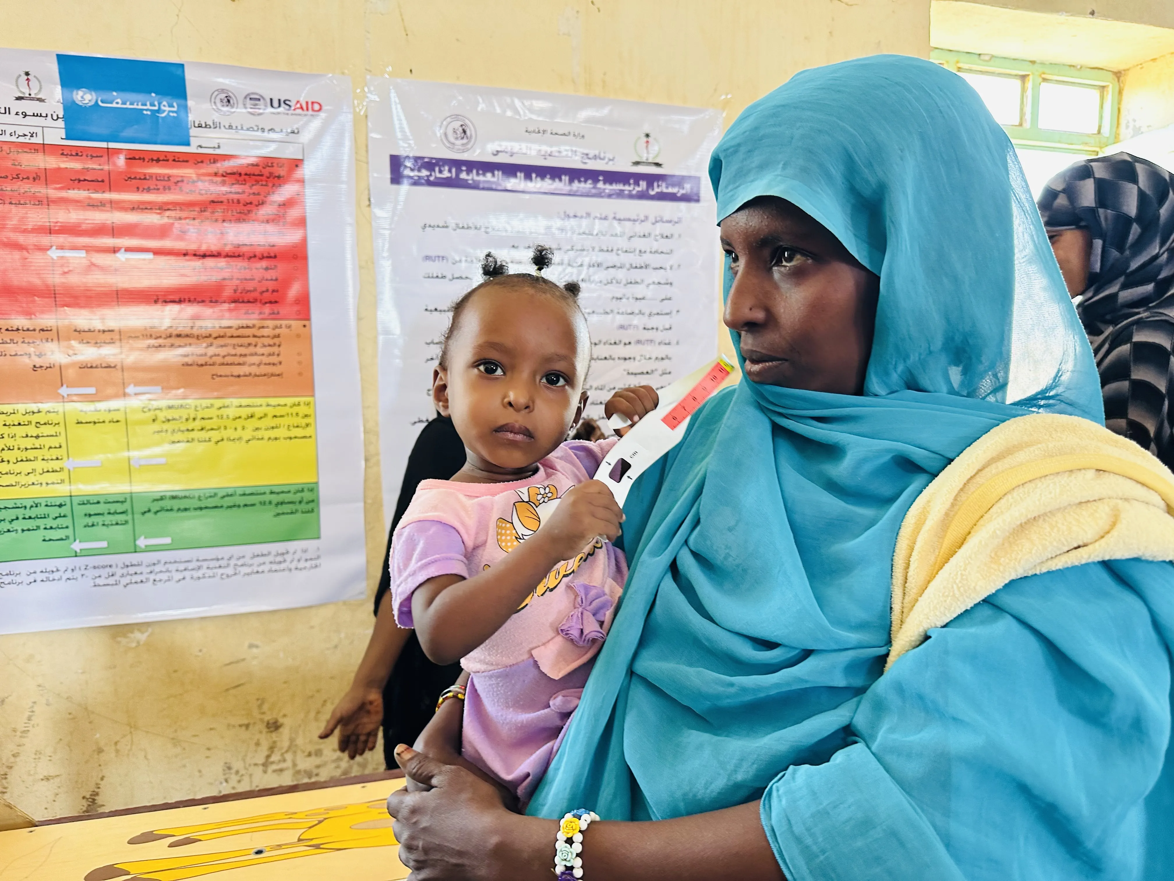On 24 May, mothers and children attend a mobile clinic organized by UNICEF and Patients Helping fund (PHF) in Silkiy locality, a hard-to-reach area in Kassala state.