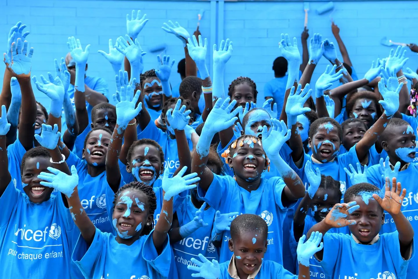 Children dressed in UNICEF t-shirts celebrating World Children’s Day