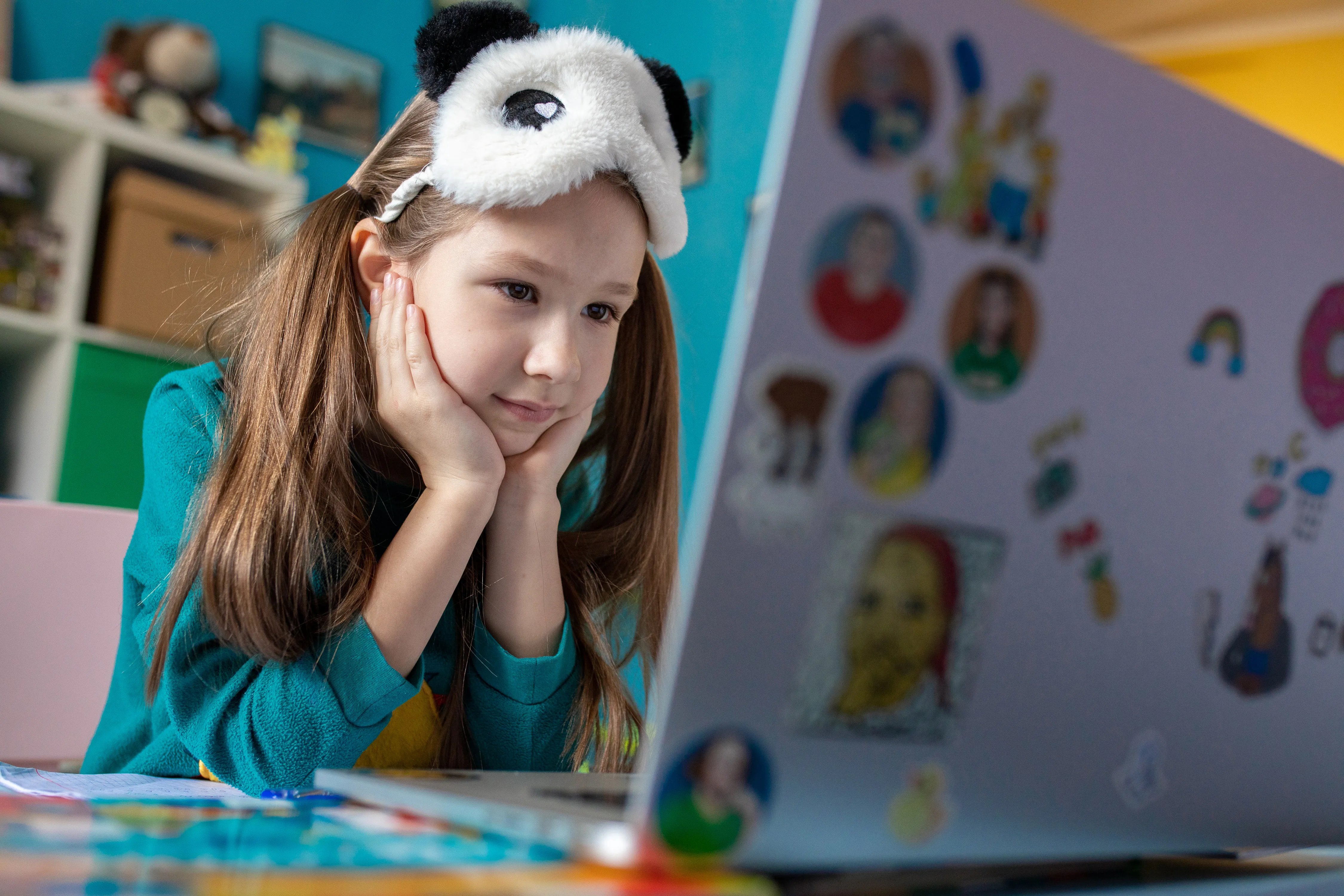 On 15 April 2020 in Kyiv, Ukraine, Zlata, 7, works on schoolwork from home, with all schools in the country closed as part of measures to combat the spread of COVID-19. 