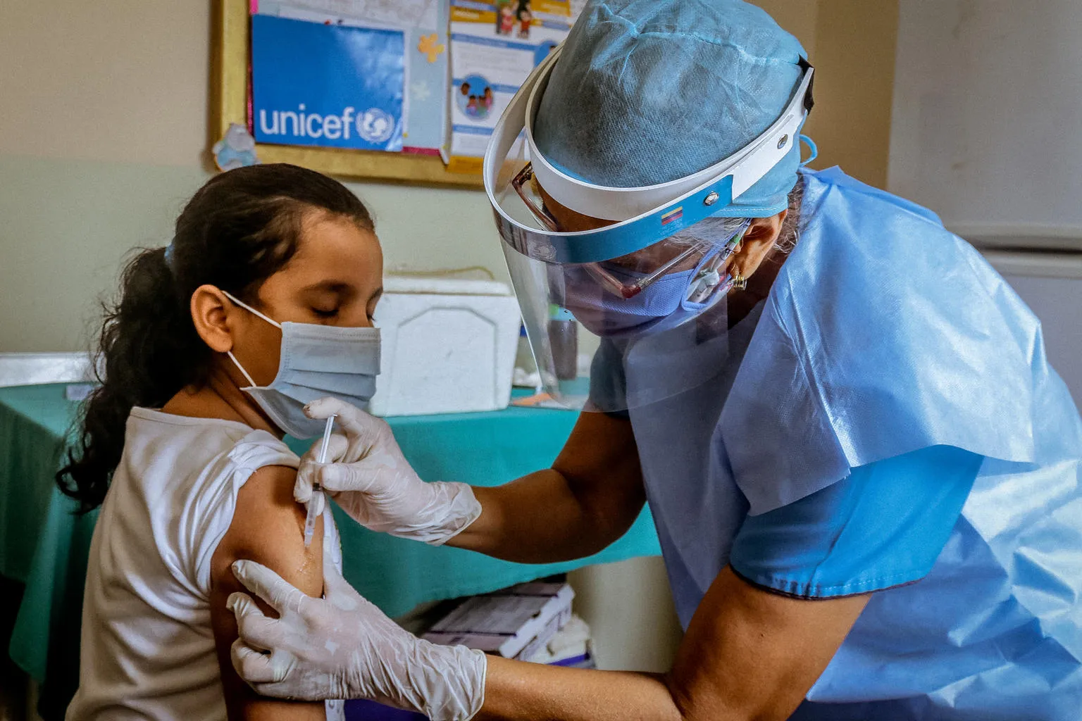 Paulina,10, is vaccinated in a health center located in Bolivar state where UNICEF distributed Polio, Yellow Fever, Tetanus Toxoid and BCG, on July 2, 2020.