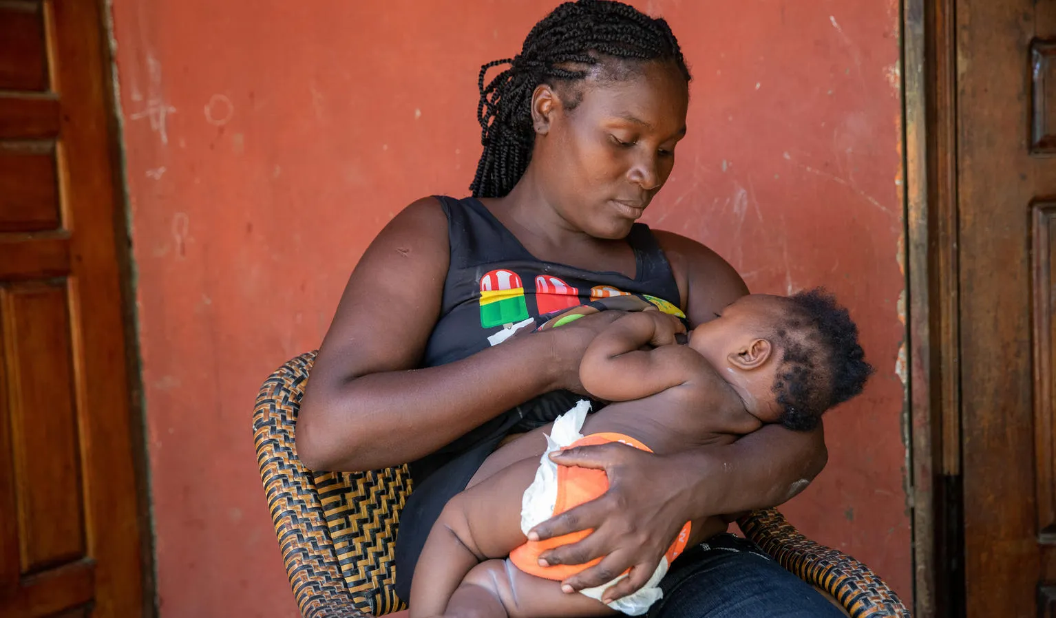30-year-old Josena Alditor breastfeeds her 7-month baby boy Marc Carlo in Cap Haitien, Haiti.