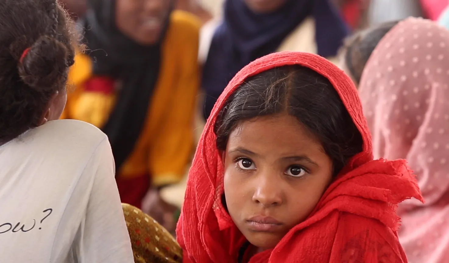 A portrait of a young girl at a Child Friendly Space (CFS) supported by UNICEF in Atbara, Sudan.
