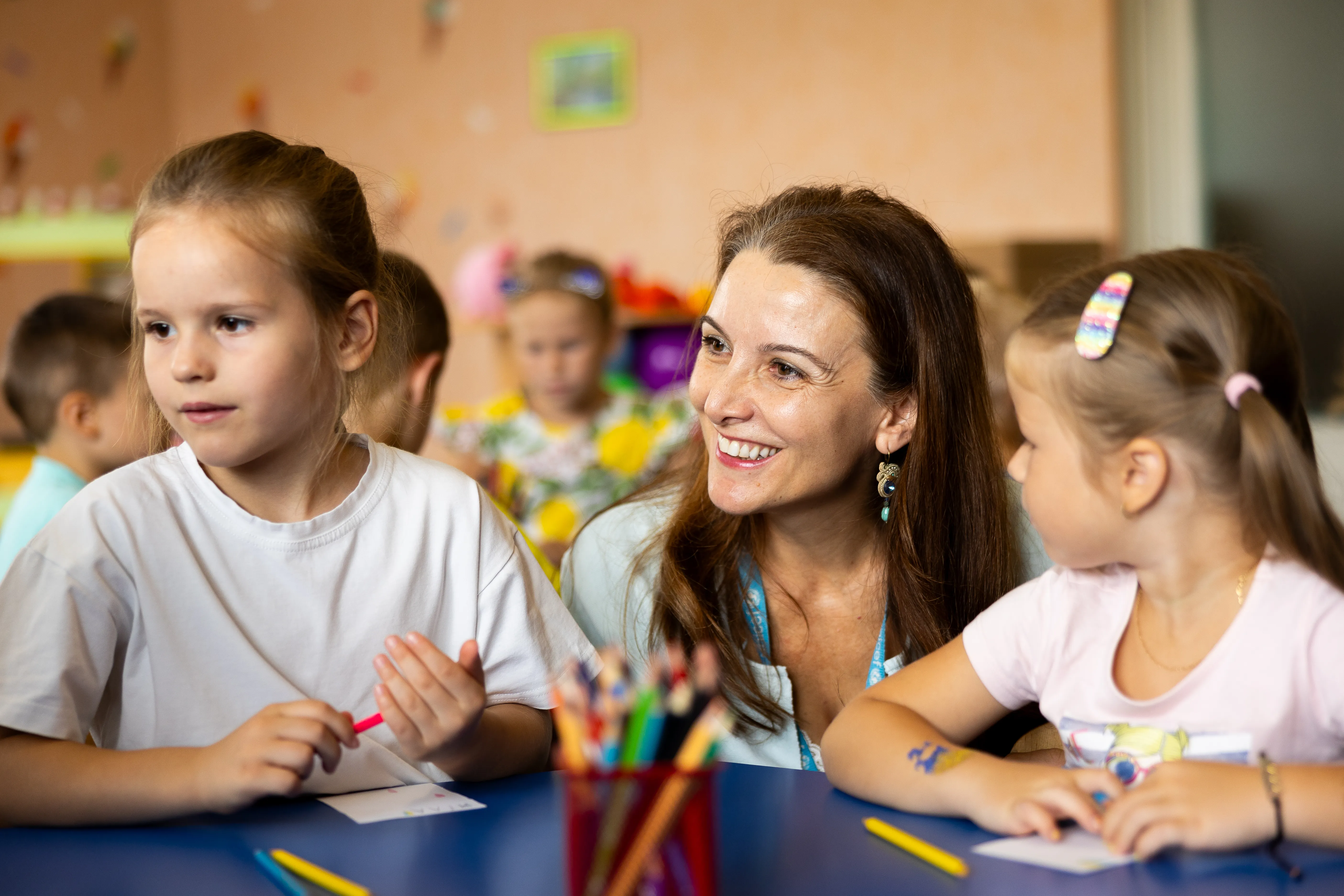 Regina De Dominicis, UNICEF Regional Director for Europe and Central Asia, is communicating with preschool children during her visit to "Lisova Pisnya" - one of the kindergarten, supported by UNICEF.