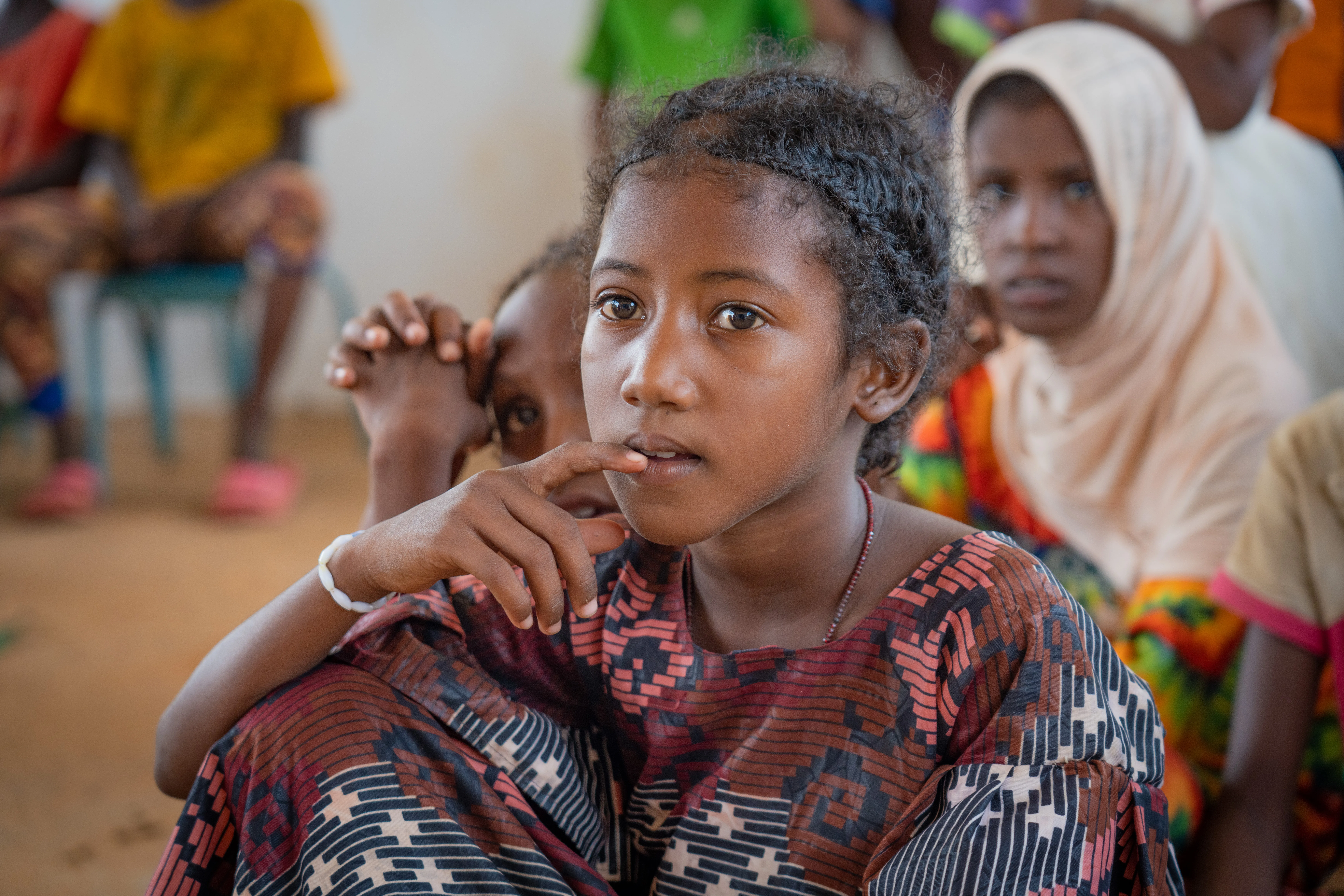 A displaced girl takes part in remedial classes to prepare for the return to school in the BAWA displaced person site
