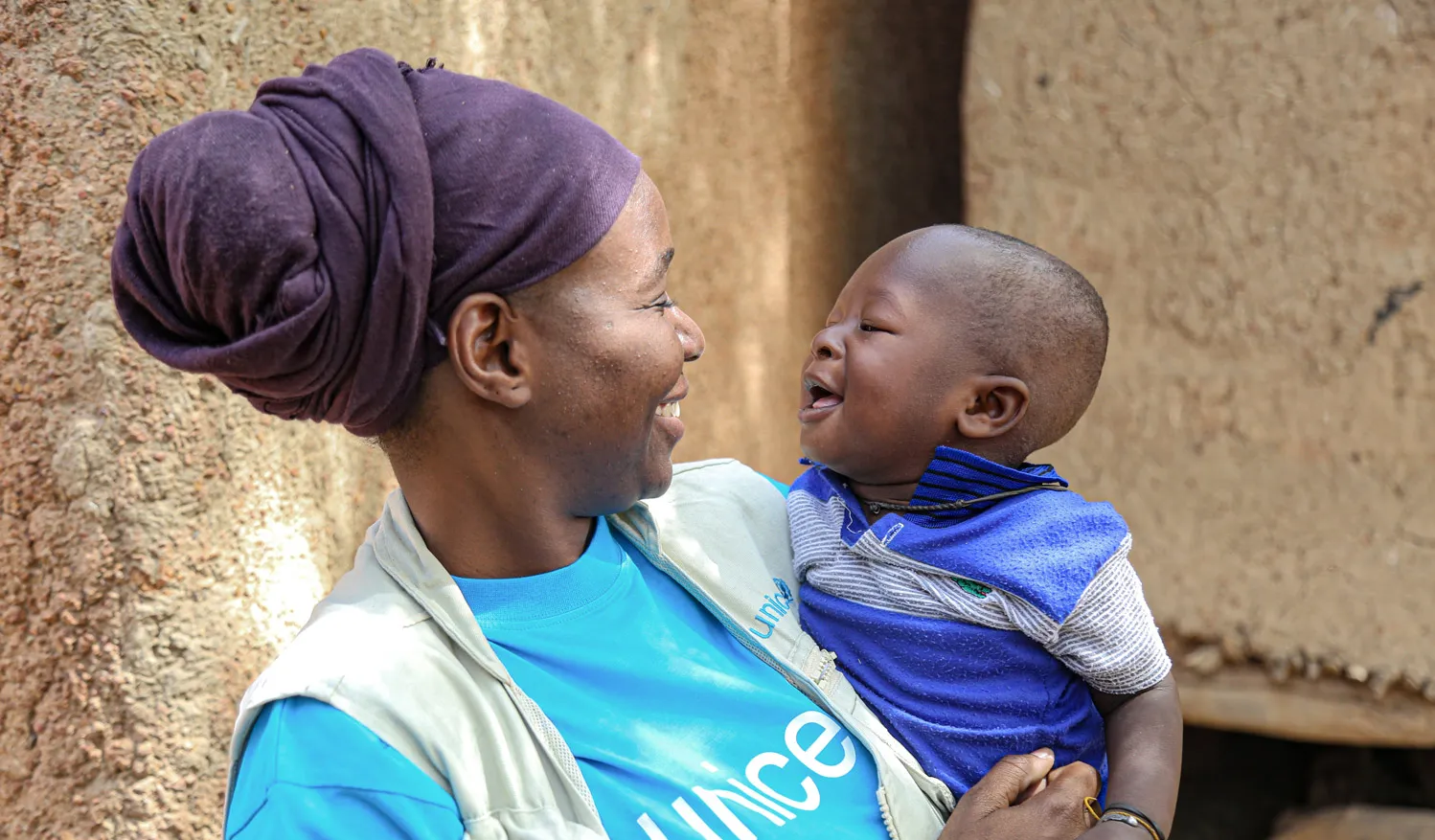Woman holding a child