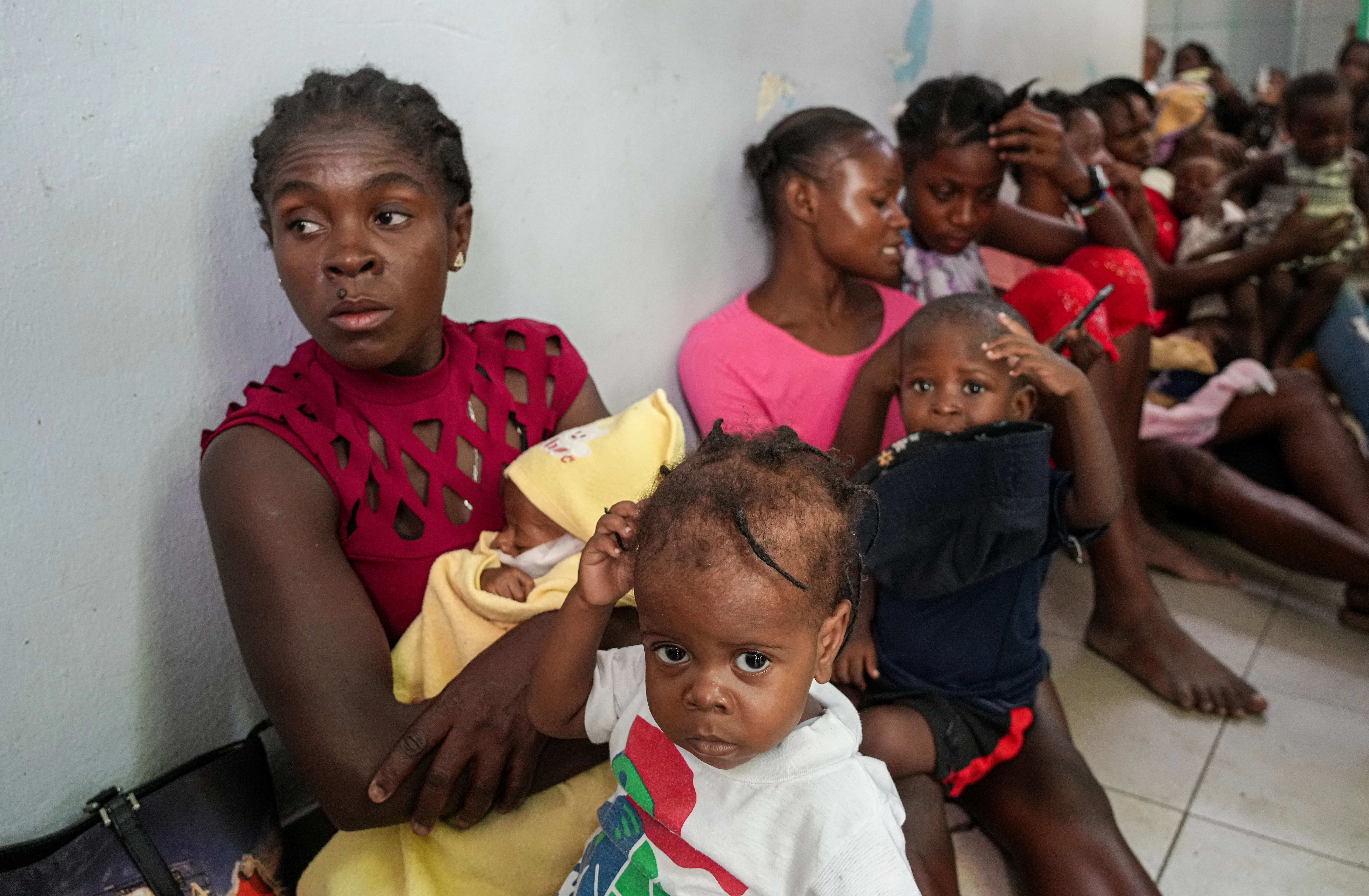 An image of mothers and children at La Paix University Hospital, where hundreds of mothers brought their children for screening and treatment of malnutrition. 