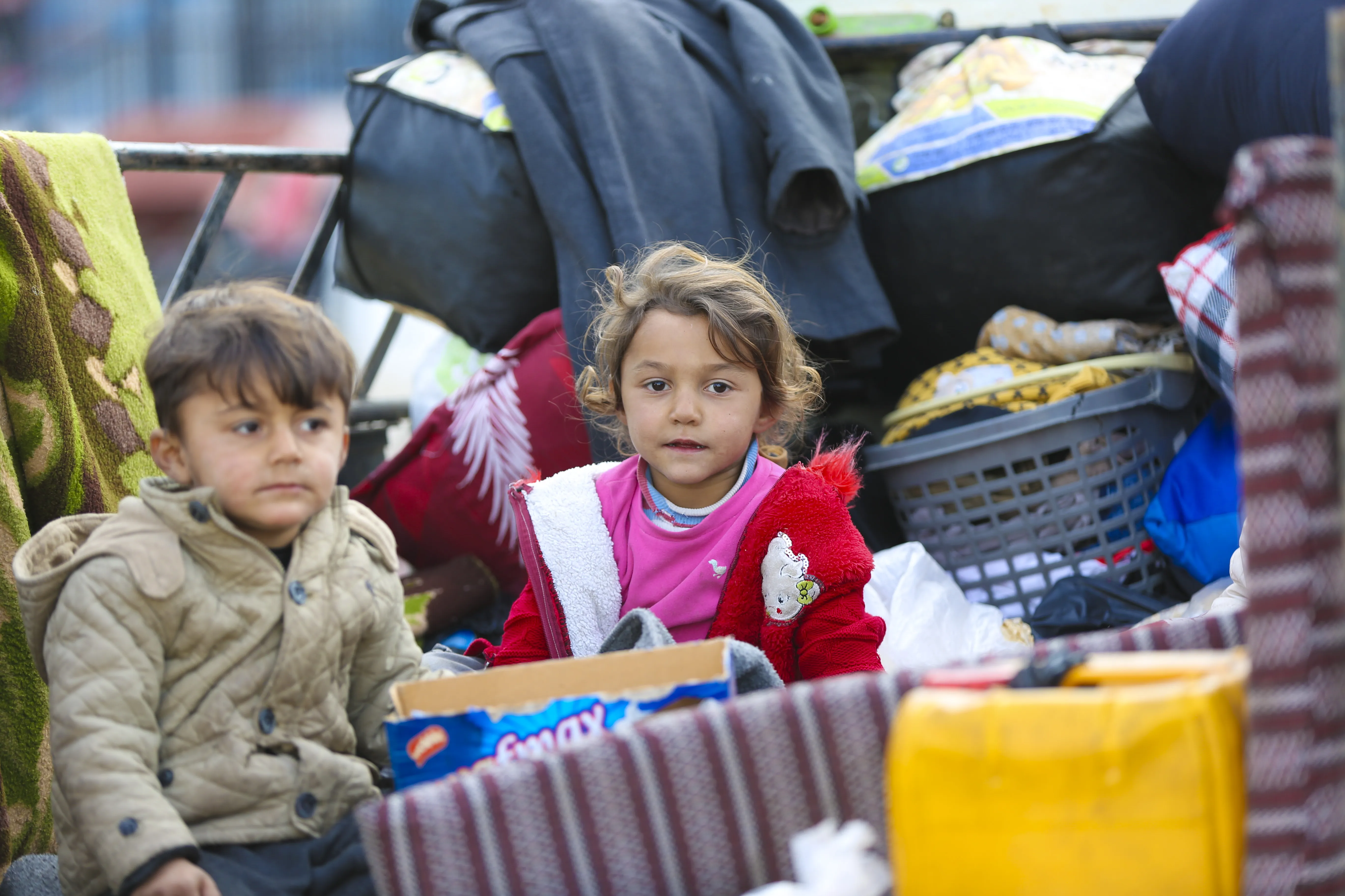 Children among the newly arrived families at a reception centre in Ar-Raqqa city, Syria, on 4 December 2024, who fled the escalating violence in Aleppo