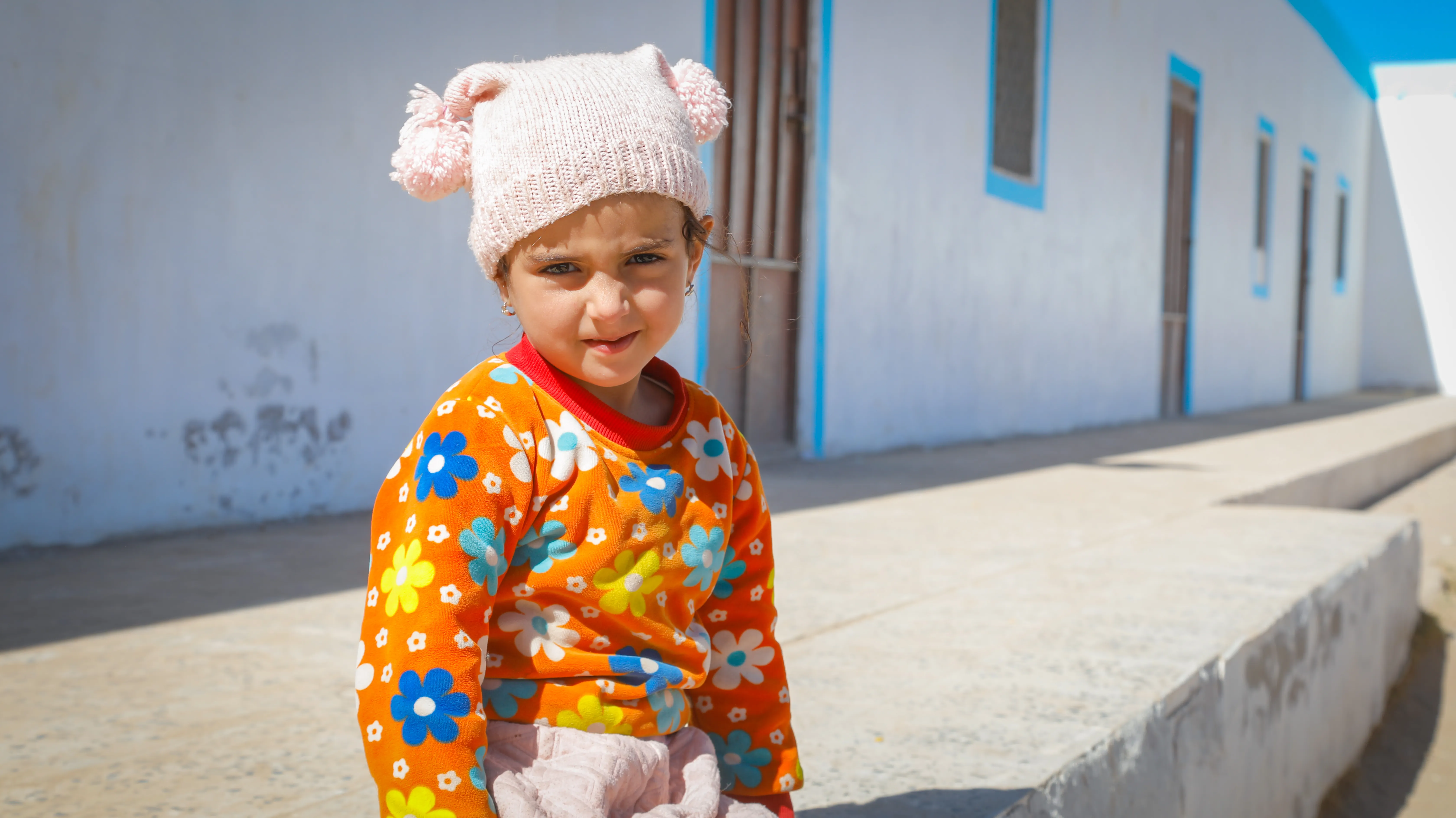 Three-year-old Loli Abdel Qader stands at the UNICEF-supported mobile clinic in Yemen. 