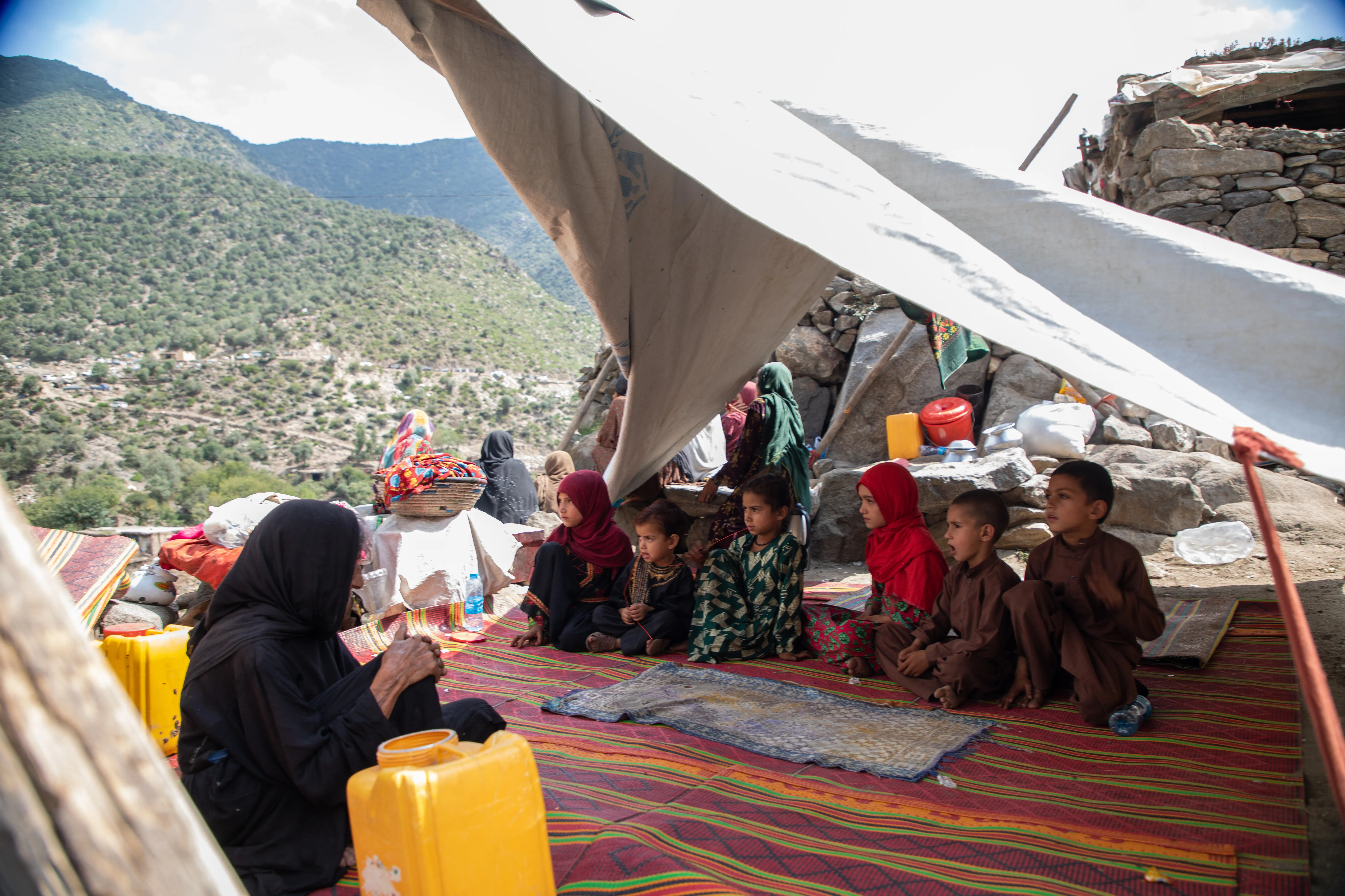 On 2 September, 2025, Zekrullah, 17 years old, was sitting with his family under a tent after the earthquake in Ghazi Abad village, Nurgal district, Kunar province, Afghanistan.