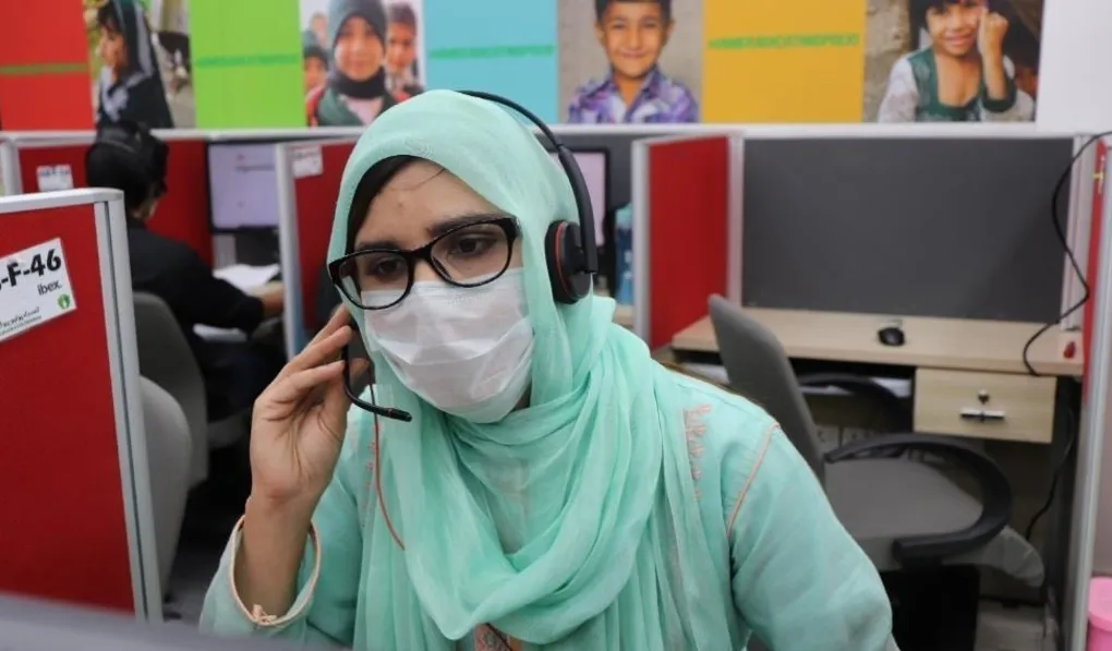 A community volunteer at the helpline offices.