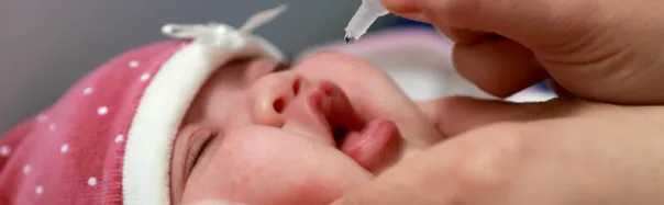 Two-month-old baby receives the crucial oral polio vaccine (OPV) drops. Algiers, November 2025