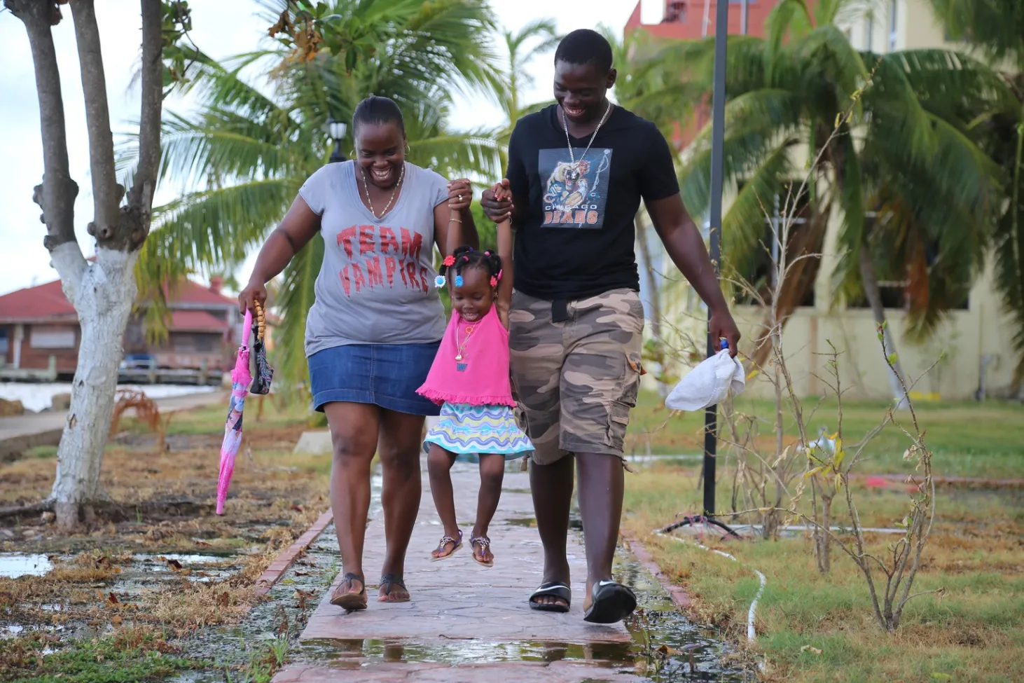 Alishia, her mother and her brother, 17-year-old Andrew, taking a stroll in Belize City.