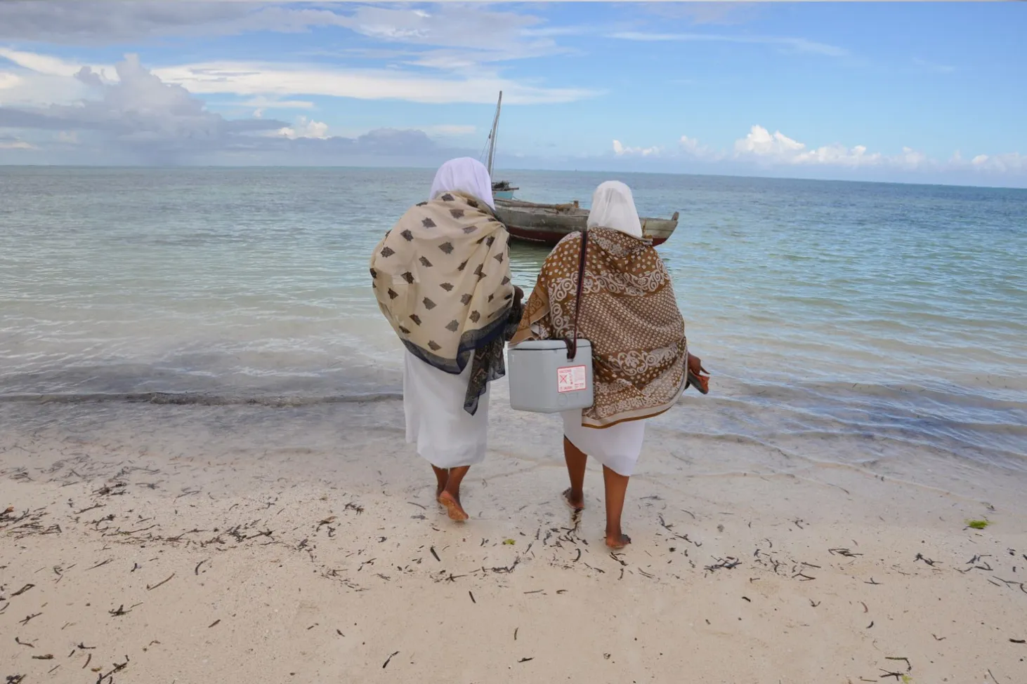 Health workers deliver vaccines to children on the island of Zanzibar