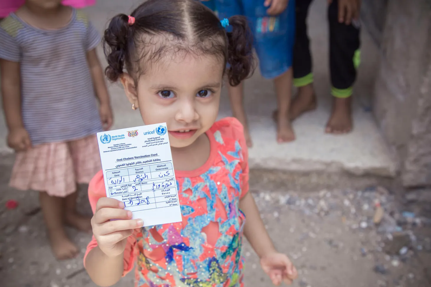 yemen girl with vaccination card