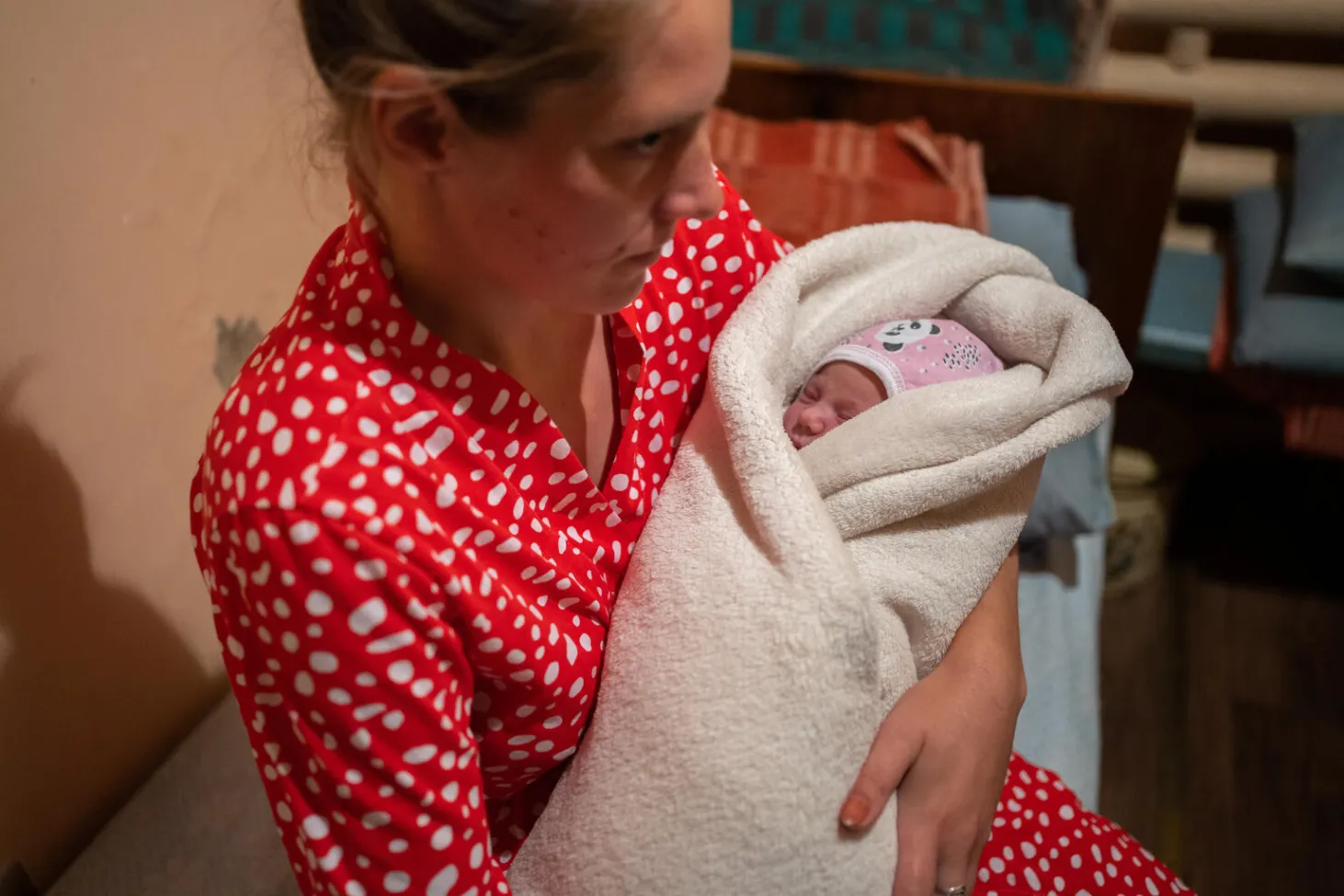 Оksana holds her daughter Hanna