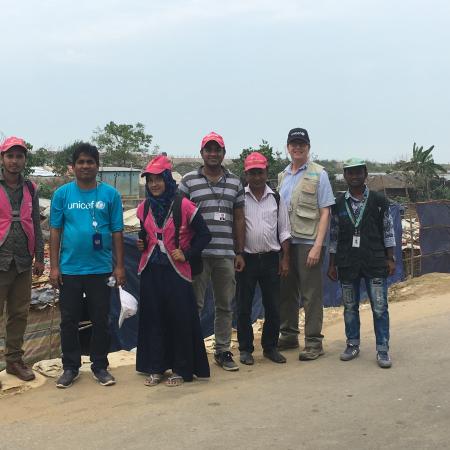 David Morley poses with UNICEF field workers.