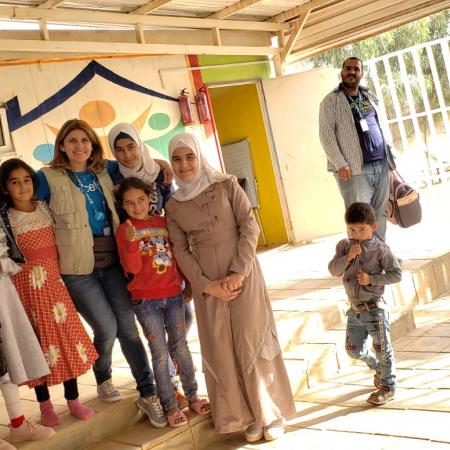 Bayan Yammout with school children in Zaatatri, Jordan.