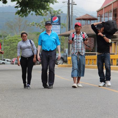 David Morley with Honduran youth migrants.