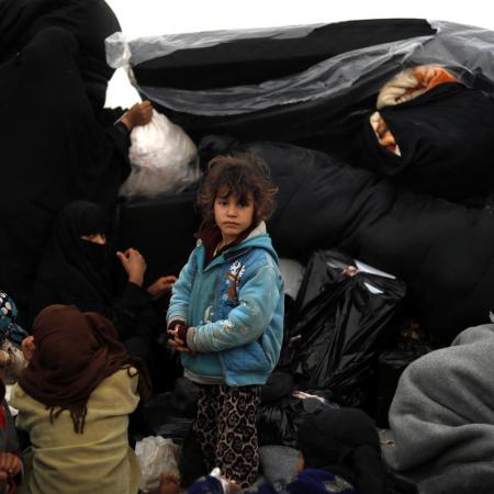 Families are welcomed into tents in the reception area of Al-Hole camp, in Syria. December 2018