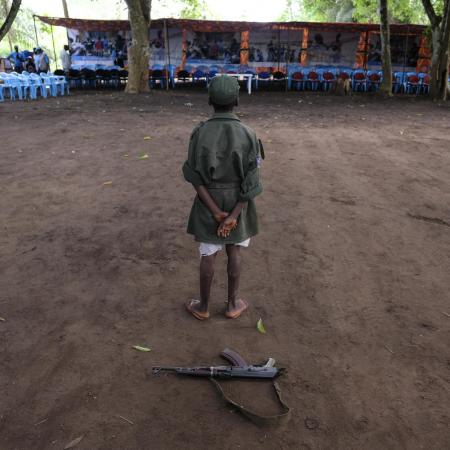 A former child soldier takes part in a reintegration ceremony.