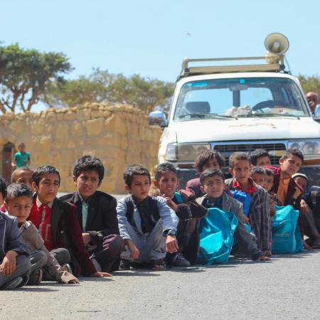 Children wait to be vaccinated in Dhamar, Yemen