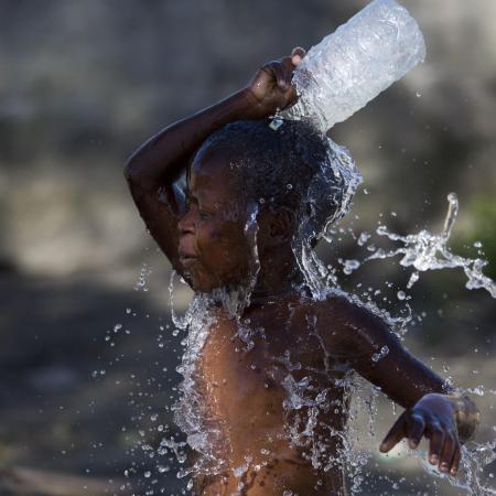 boy washes himself