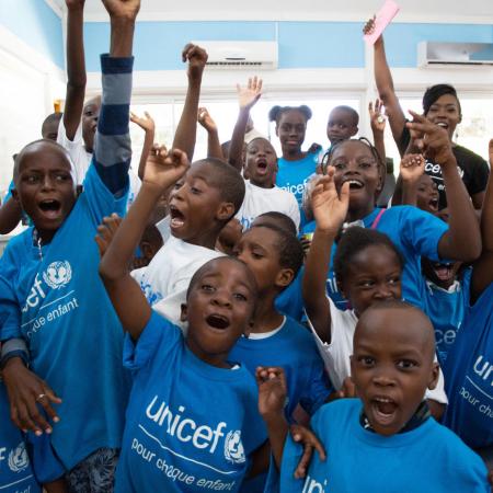 Children in Cote D'Ivoire celebrate Easter at a UNICEF sponsored event.